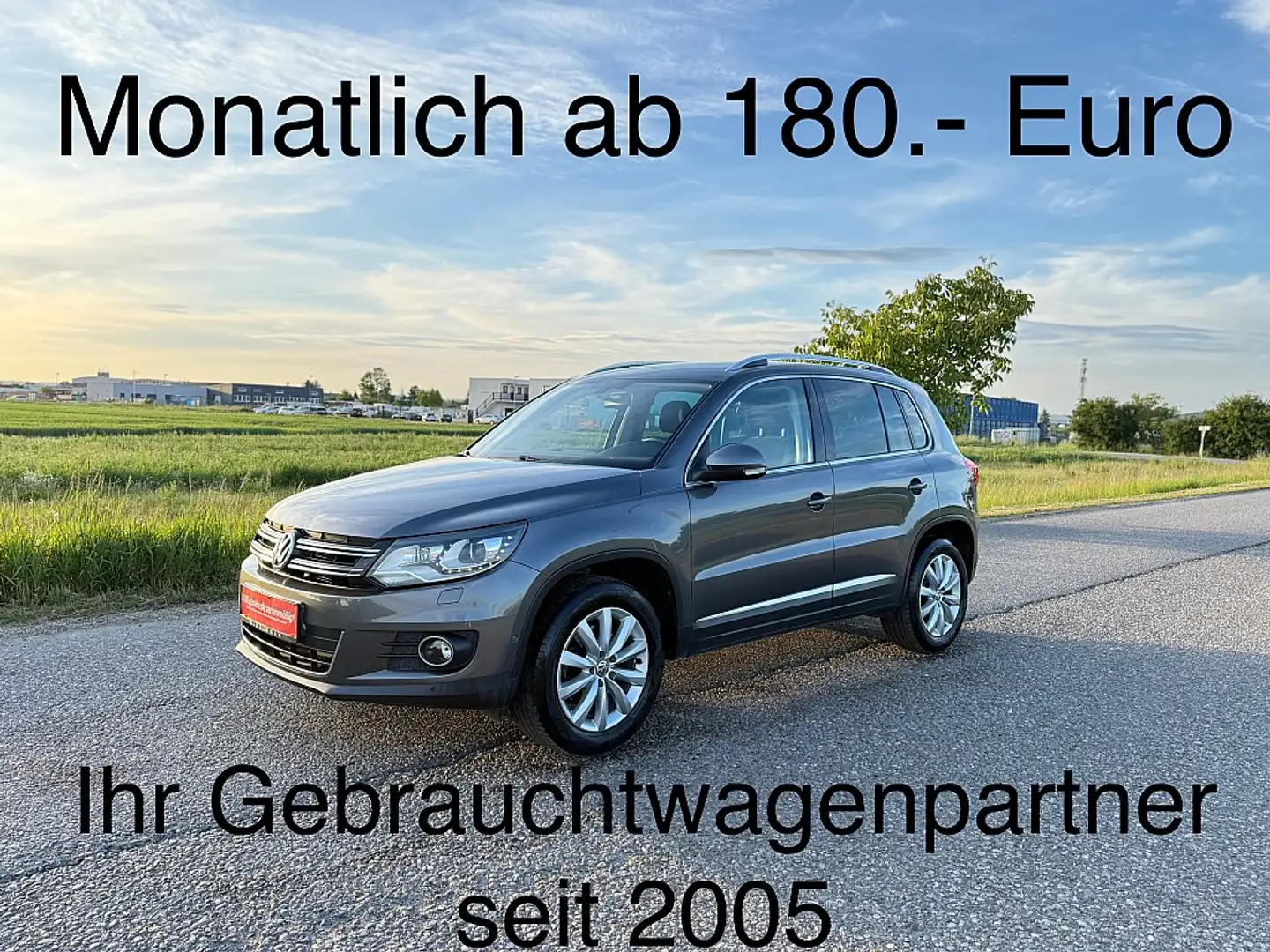 Volkswagen Tiguan 2,0 TDI BMT 4Motion Sky DPF DSG Grijs - 1