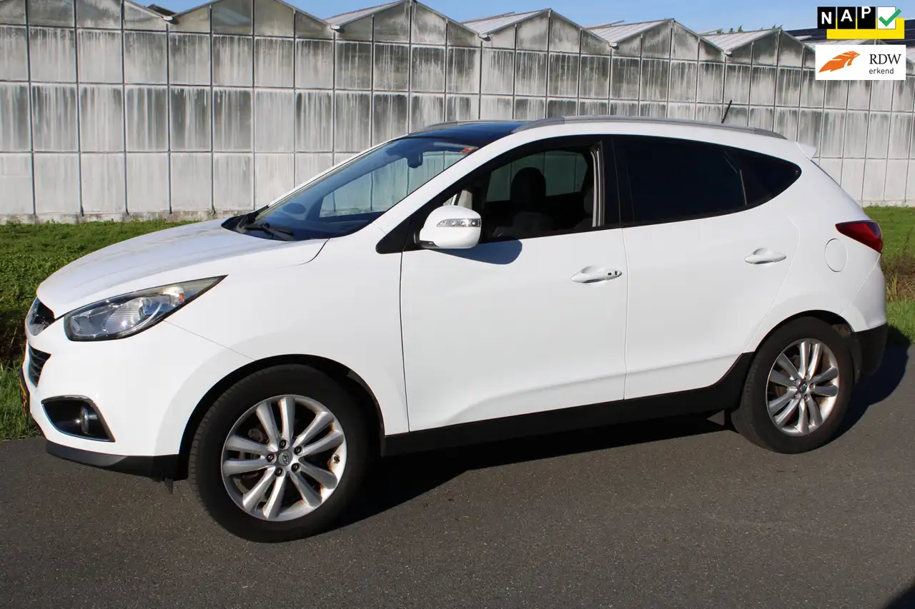Hyundai iX35 2.0i i-Catcher Automaat met Leder en Navigatie — photo 1 of 21