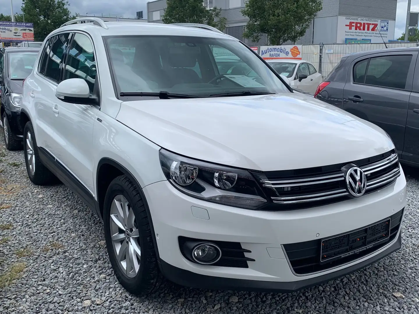 Volkswagen Tiguan 1.4 TSI BlueMotion Technology Lounge Sport Wit - 2