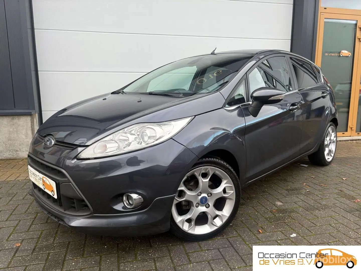 Ford Fiesta 1.6 Titanium ST-Line AircoElektrPakketBluetooth Gris - 1