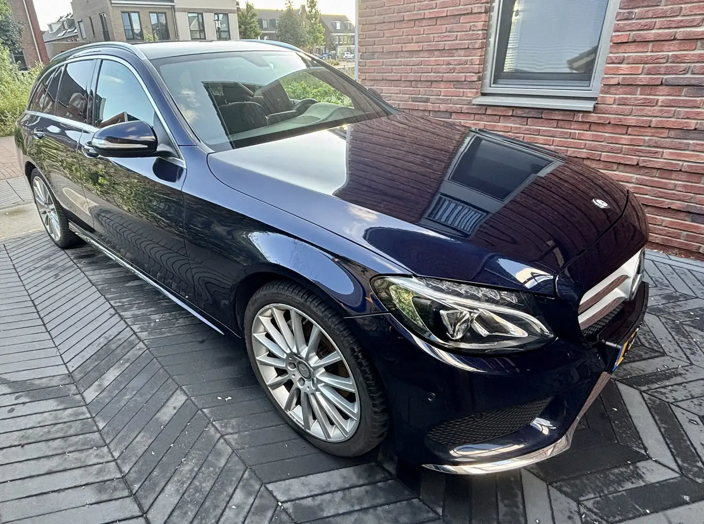 Mercedes-Benz C 180 T 7G-TRONIC AMG Line | Leder | Navigatie Blauw - 1