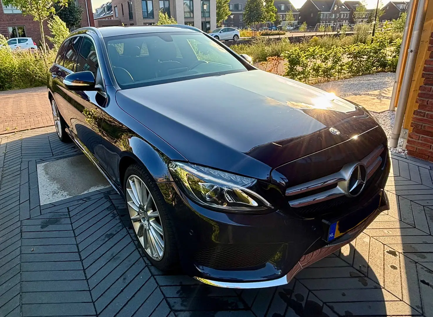 Mercedes-Benz C 180 T 7G-TRONIC AMG Line | Leder | Navigatie Blauw - 2