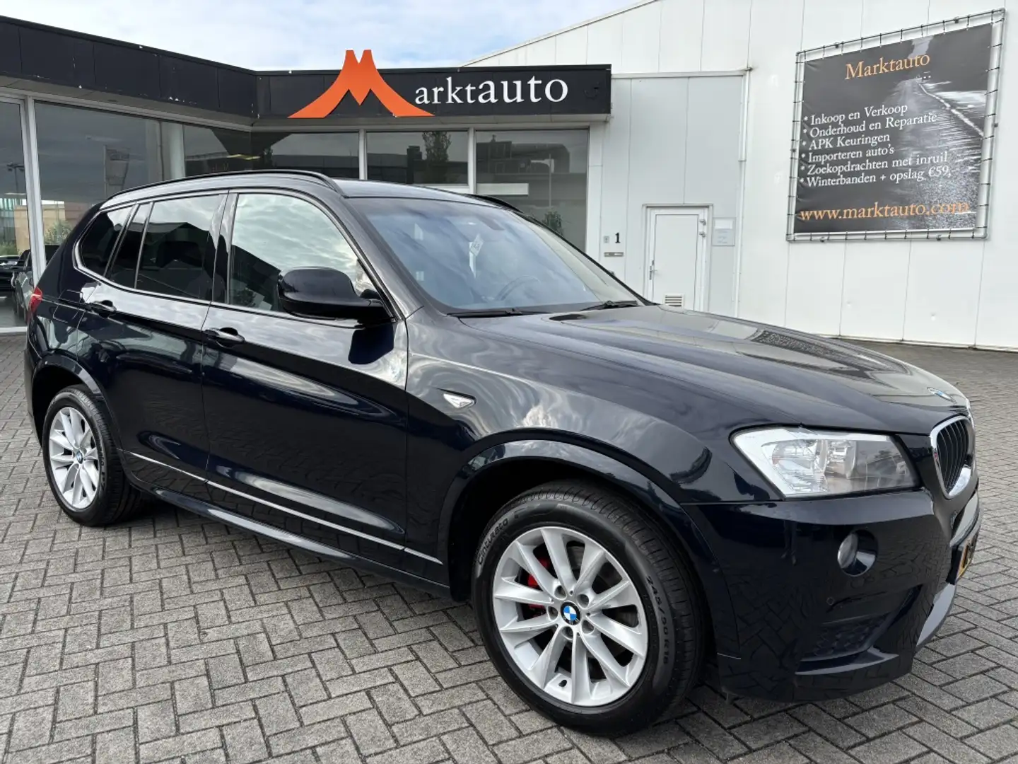 BMW X3 xDrive20i High Exec. M-Pakket PDC Bluetooth Navi C Noir - 1