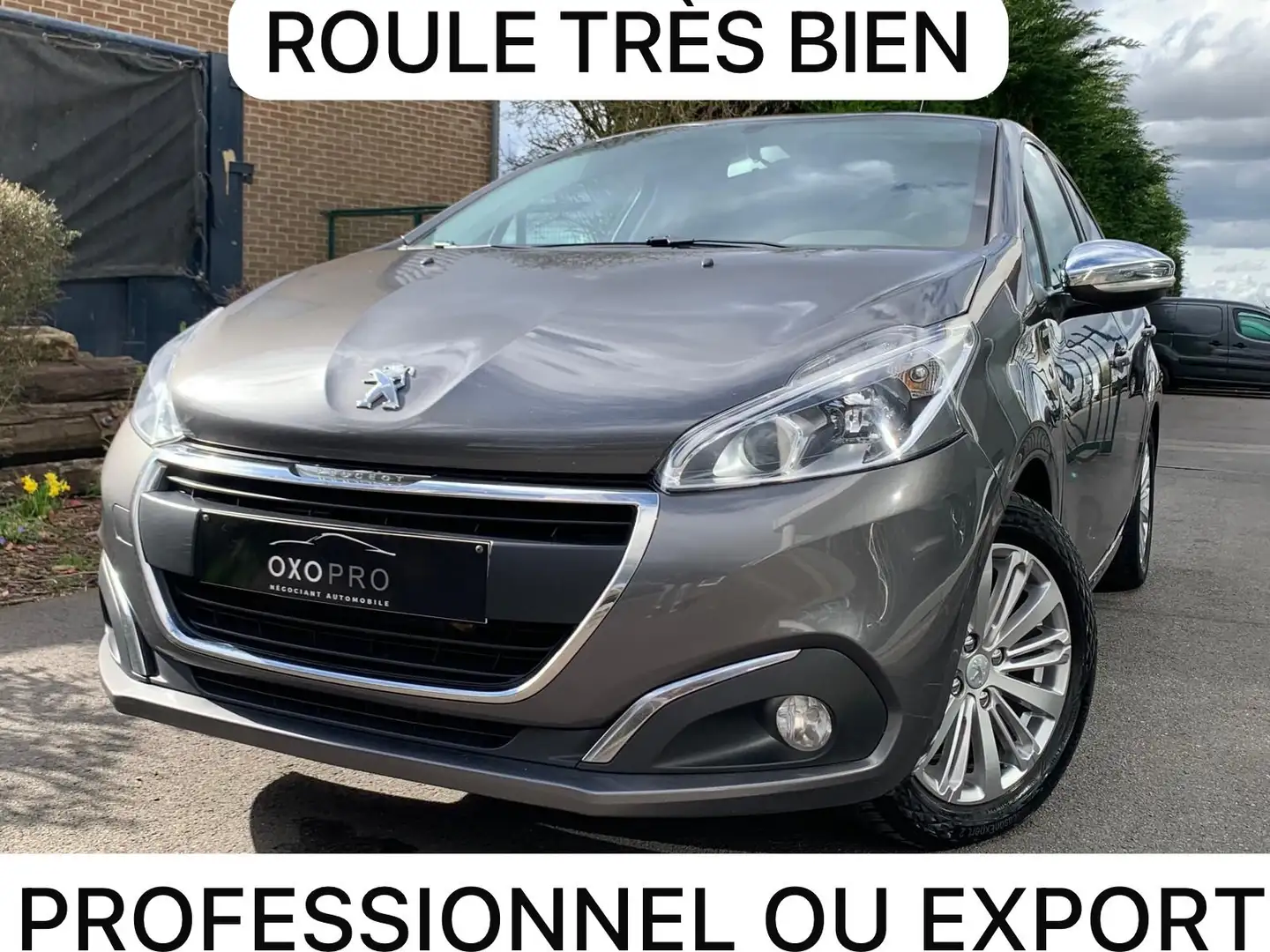 Peugeot 208 1.2i Style / Airco / Gps / Cruise / CarPlay / PDC Gris - 1