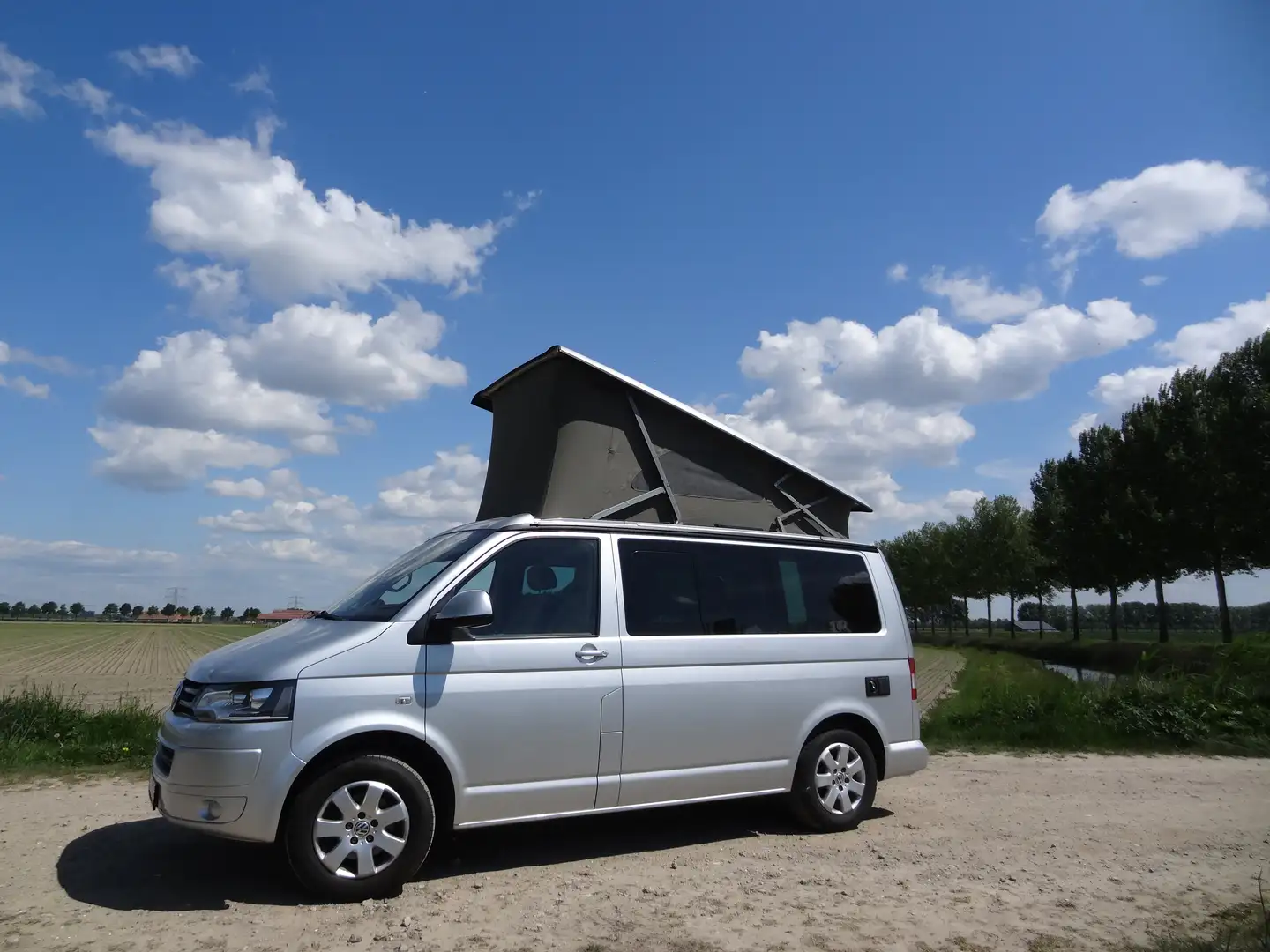 Volkswagen T5 California VW T5 California Comfort uitbouw DSG/140Pk Stříbrná - 1