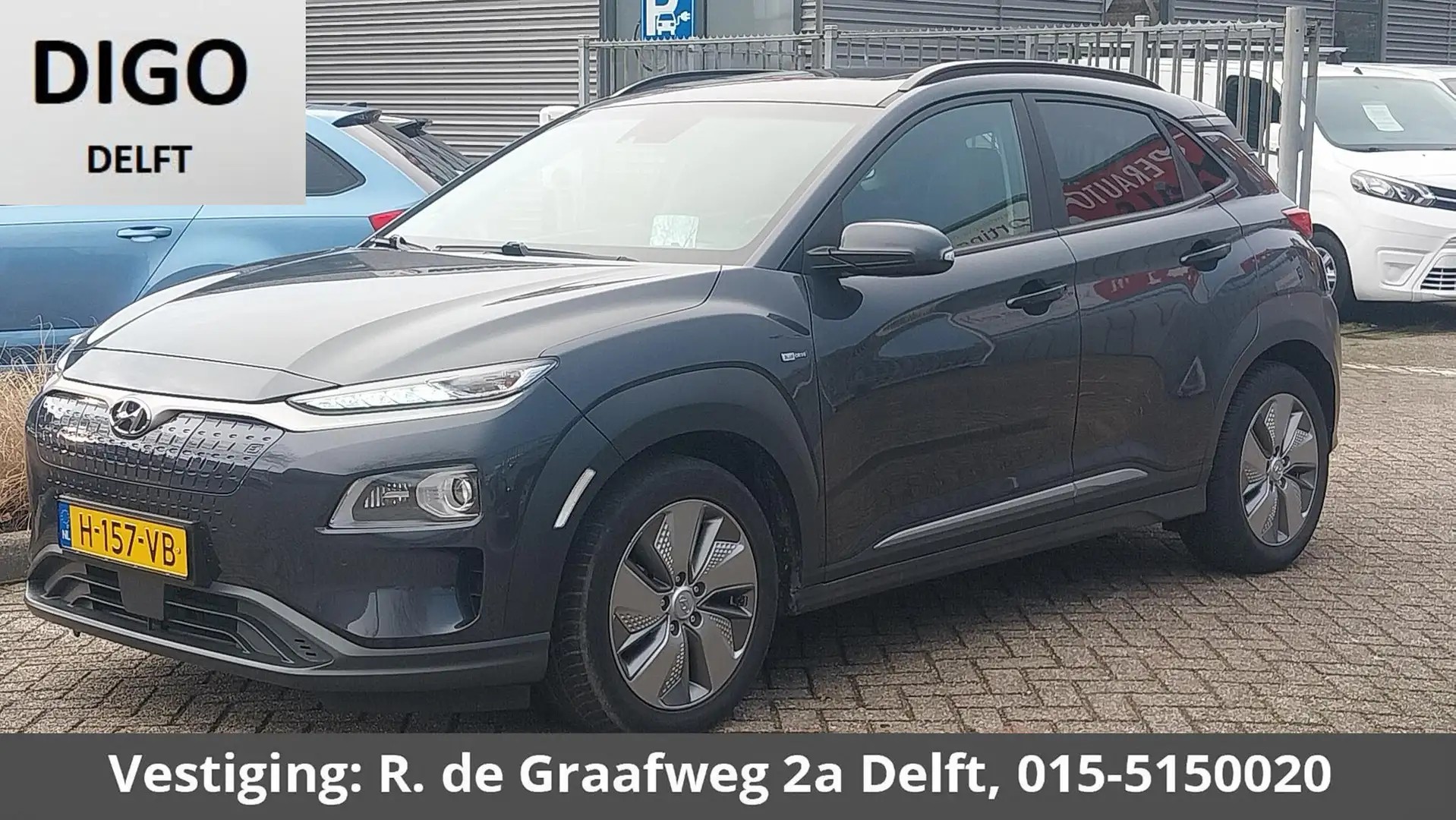 Hyundai KONA EV Premium 64 kWh | Stuur-& Stoelverwarming | Appl Grau - 1