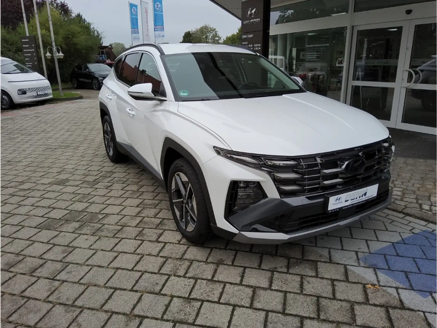 Hyundai TUCSON FL Mj25 Trend 7-DCT 4WD 1.6 CRDi +48V Navi-/LED-Pa Weiß - 1