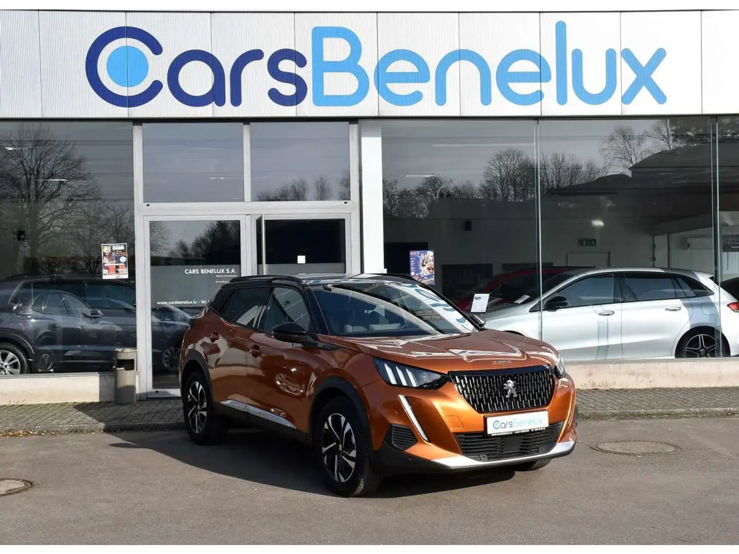 Peugeot 2008 1.2 PureTech GT CUIR REGUL GPS LANE CAM 1 MAIN Oranje - 1