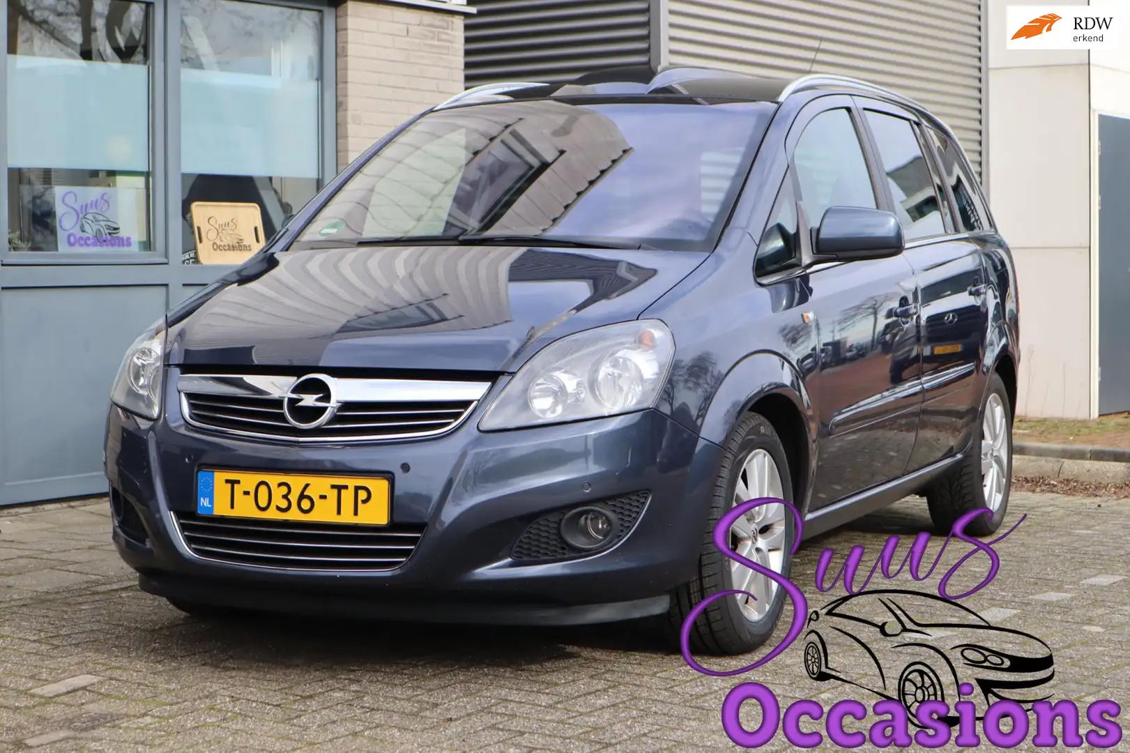 Opel Zafira 1.8 Cosmo | 7 persoons | trekhaak | Panoramadak | Blauw - 1