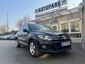 Volkswagen Tiguan 1.4 TSI Highline*Navi*PDC*1.Hand*111t KM Schwarz - thumbnail 1