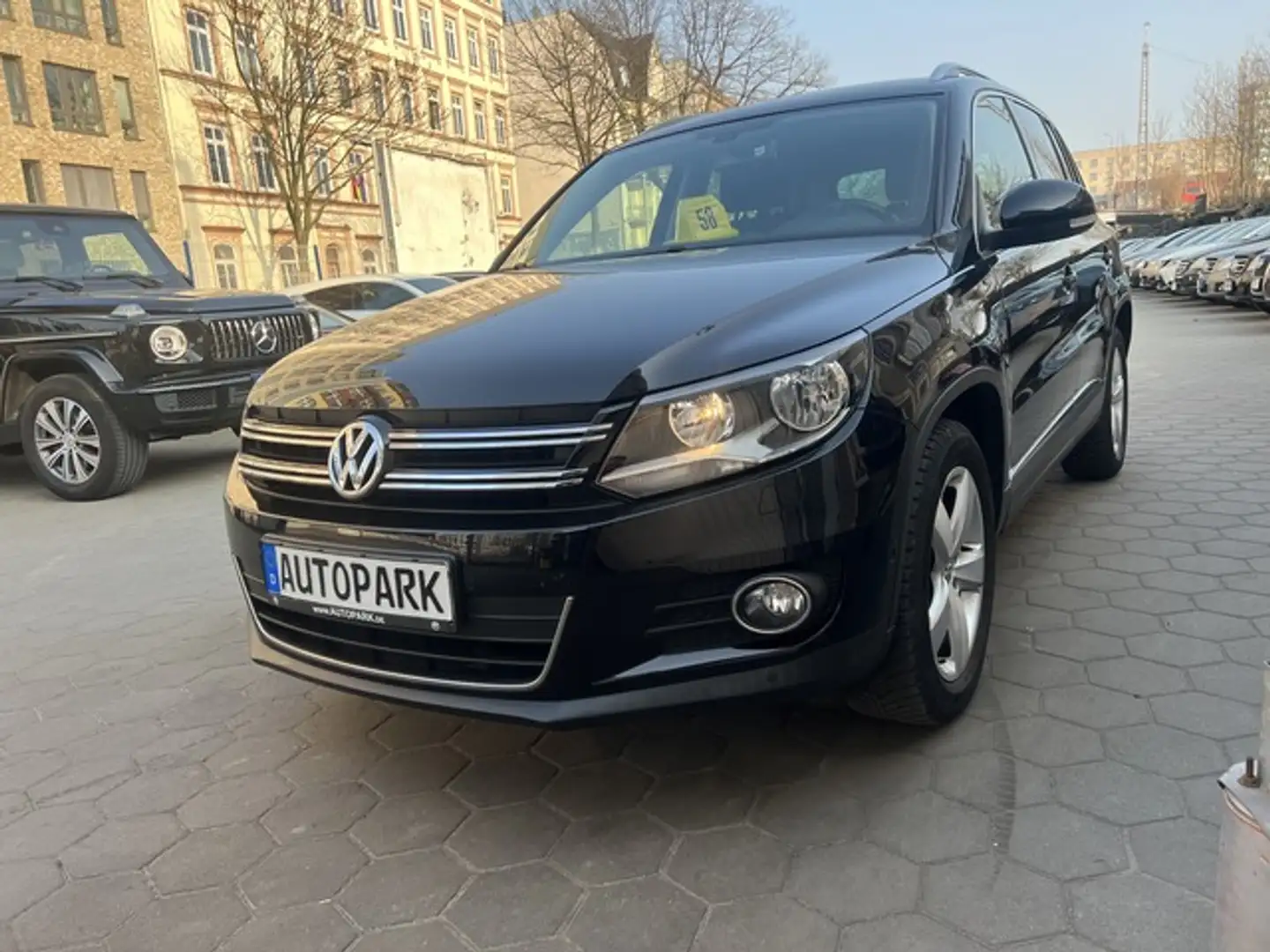 Volkswagen Tiguan 1.4 TSI Highline*Navi*PDC*1.Hand*111t KM Zwart - 2