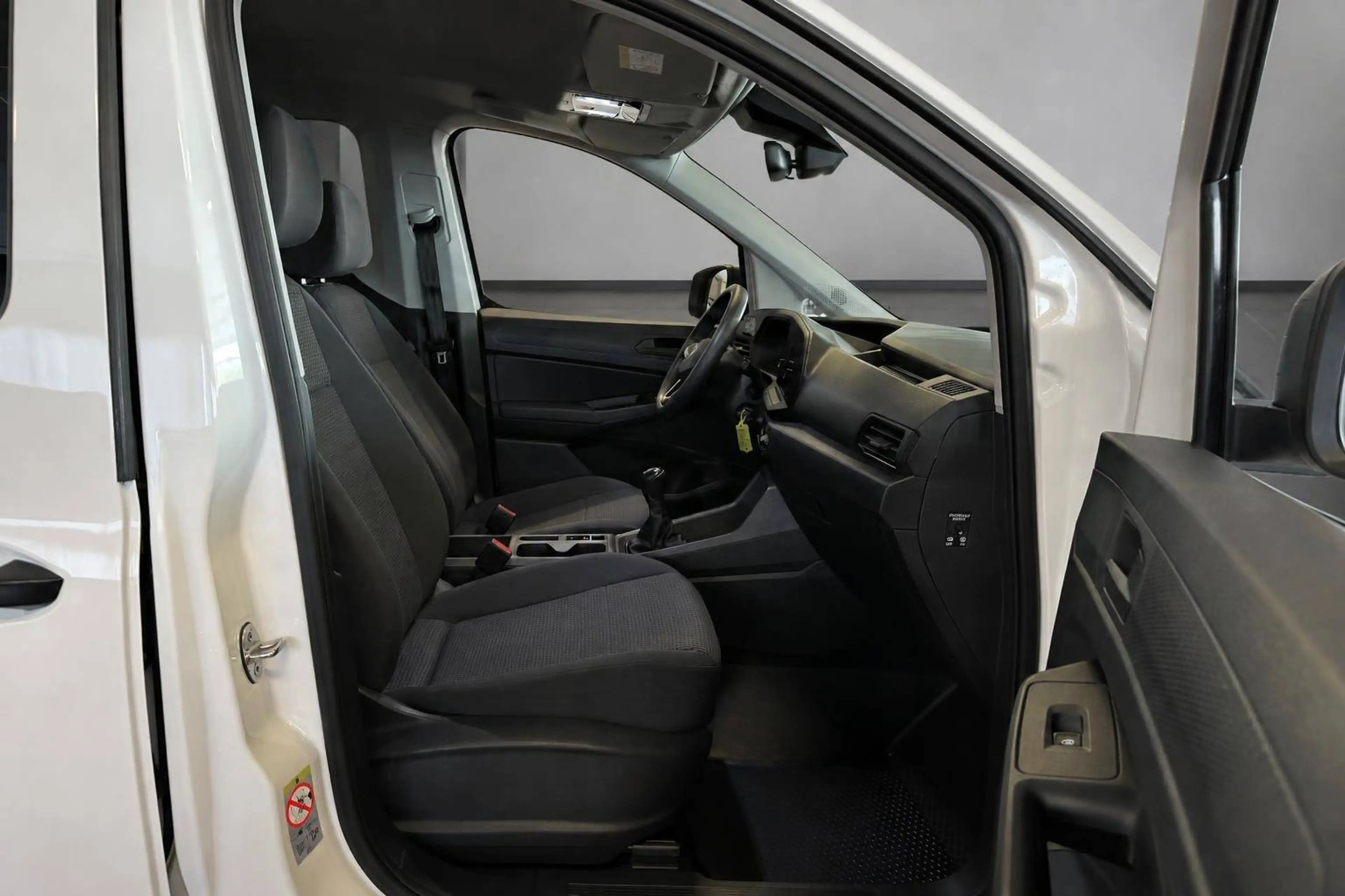 Volkswagen Caddy Kombi *1. Hand + 7 Sitzer — photo 13