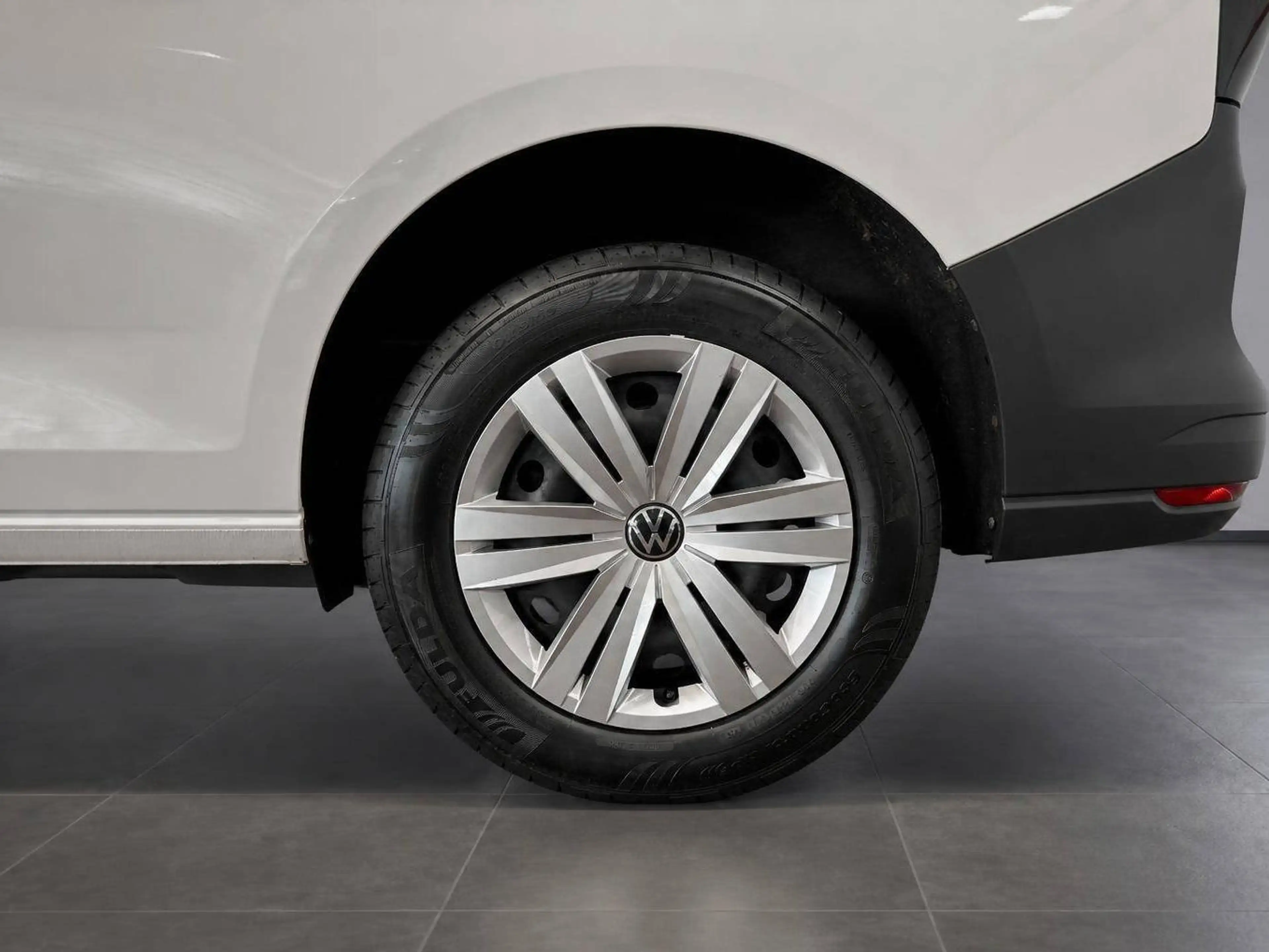 Volkswagen Caddy Kombi *1. Hand + 7 Sitzer — photo 4