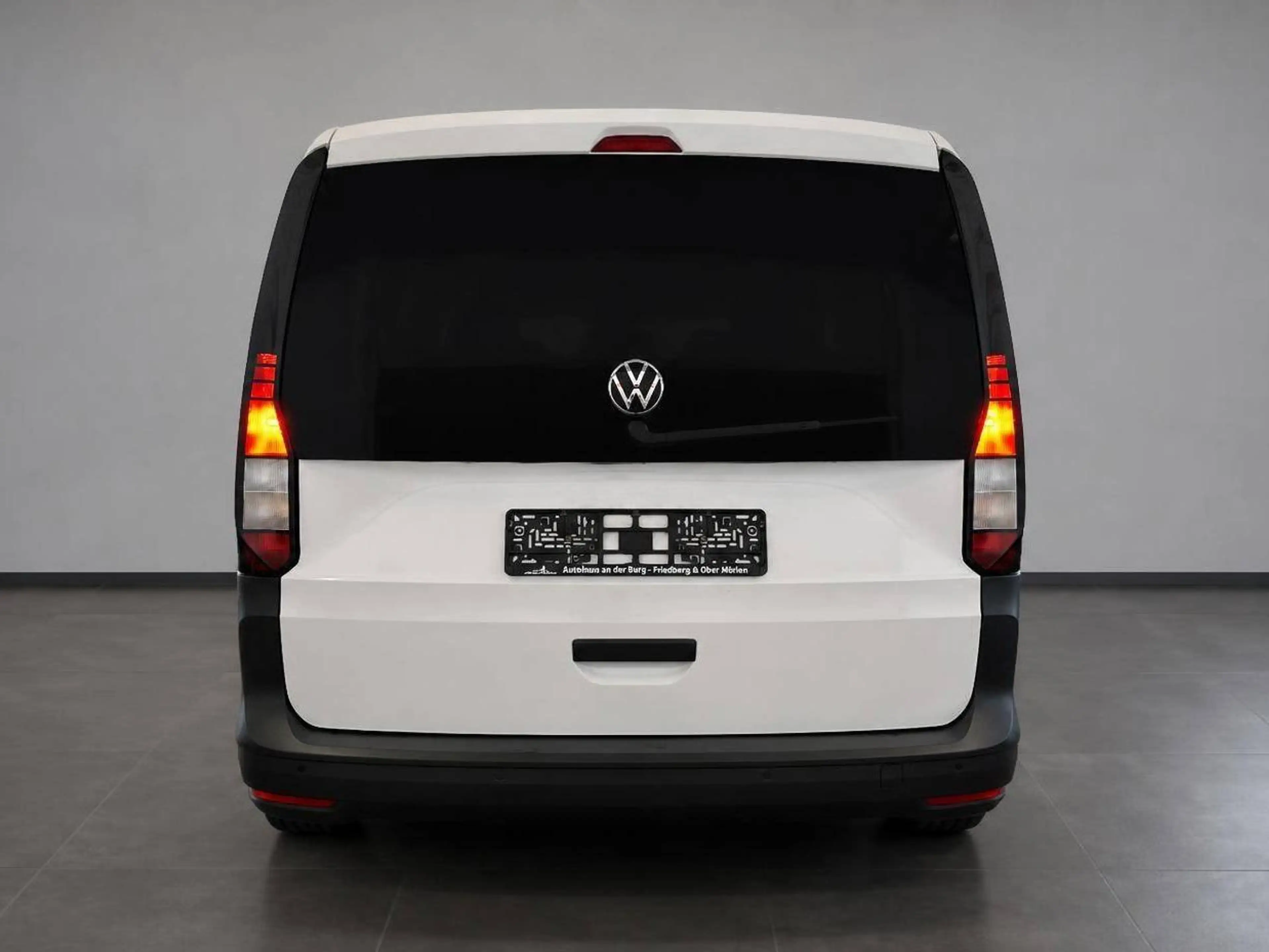 Volkswagen Caddy Kombi *1. Hand + 7 Sitzer — photo 6