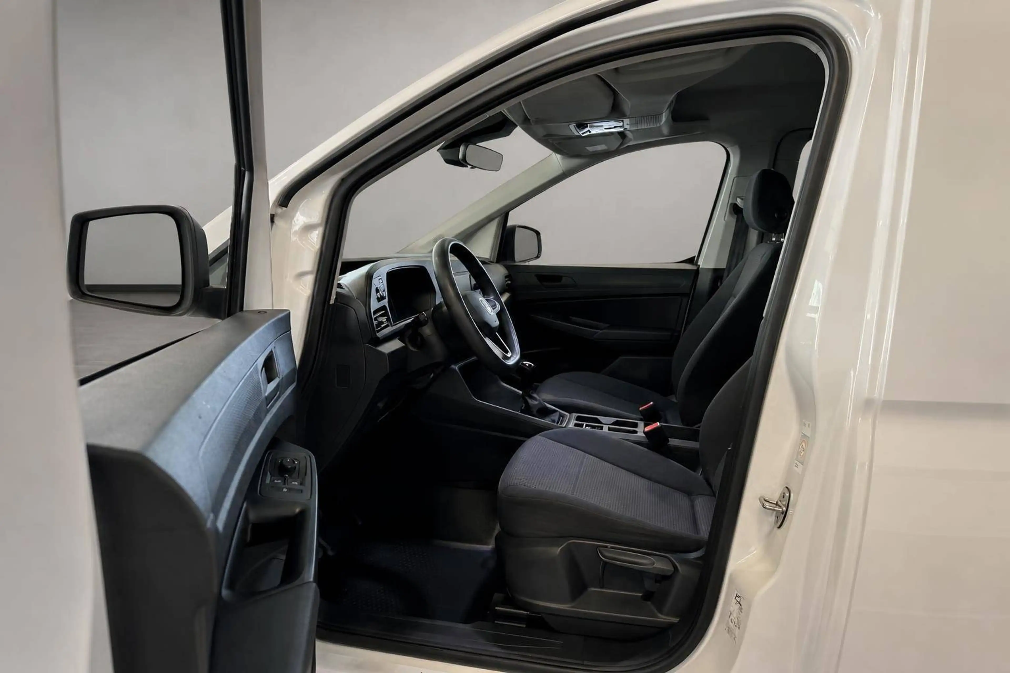 Volkswagen Caddy Kombi *1. Hand + 7 Sitzer — photo 9