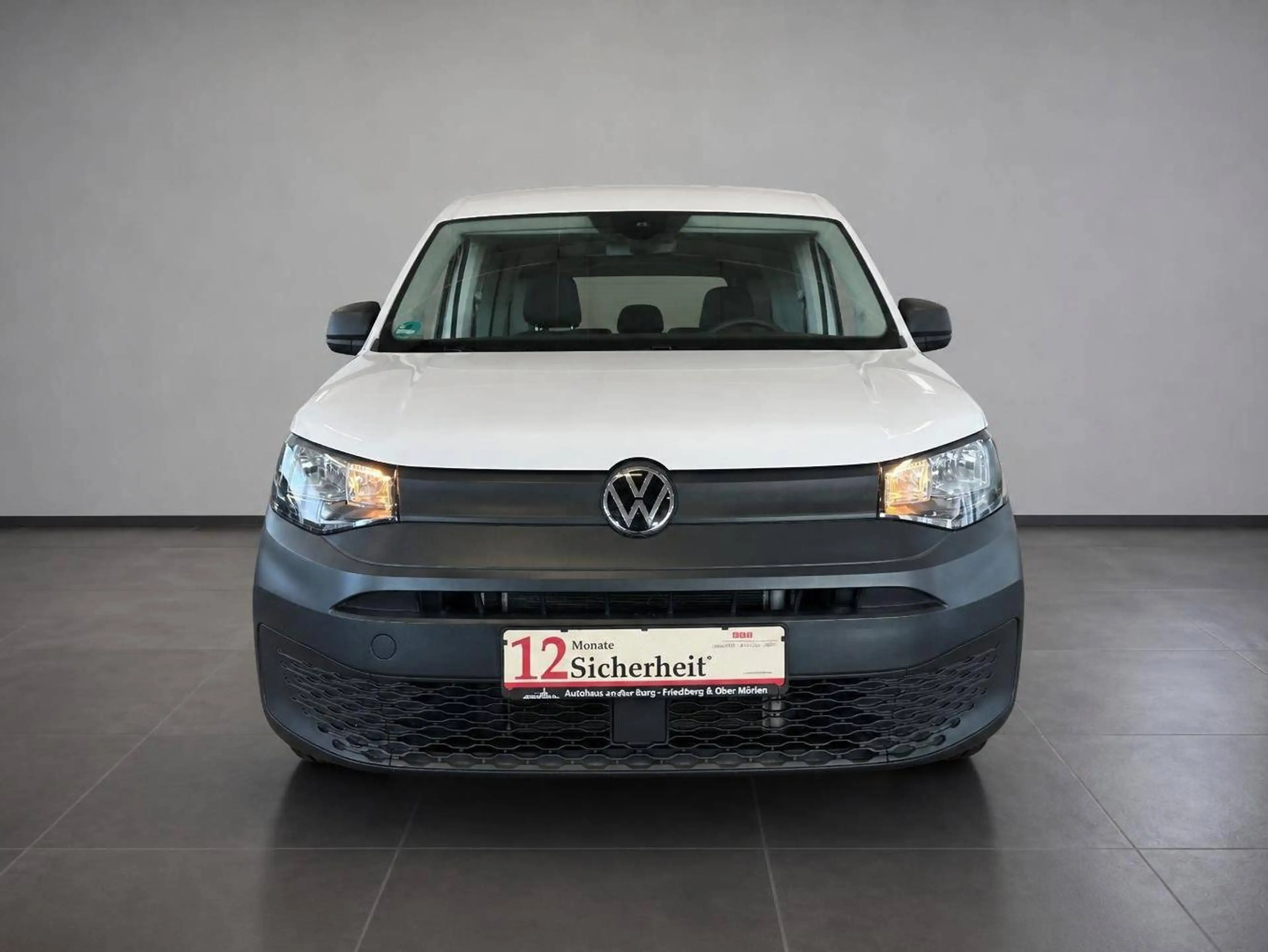Volkswagen Caddy Kombi *1. Hand + 7 Sitzer — photo 2