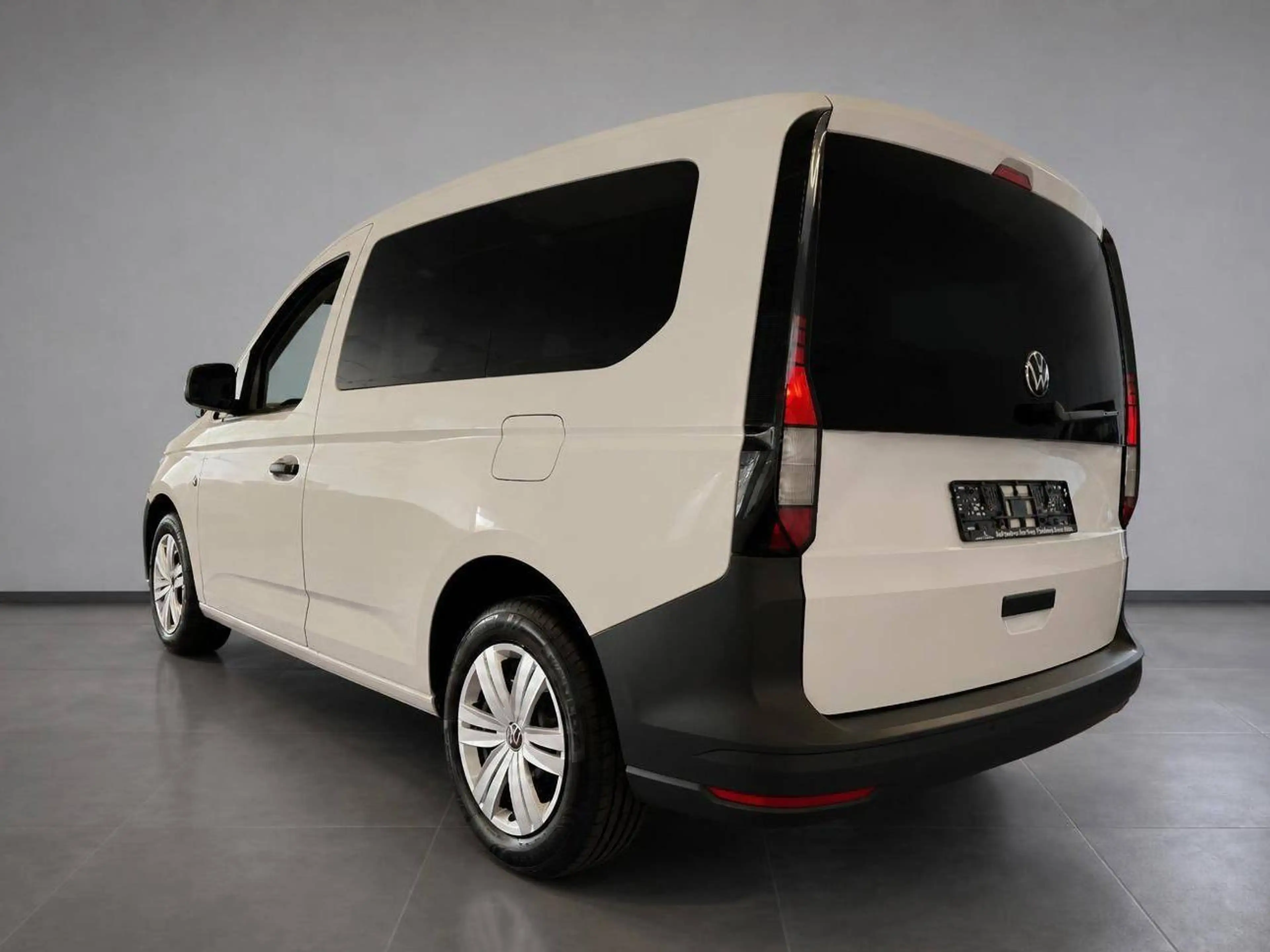 Volkswagen Caddy Kombi *1. Hand + 7 Sitzer — photo 5