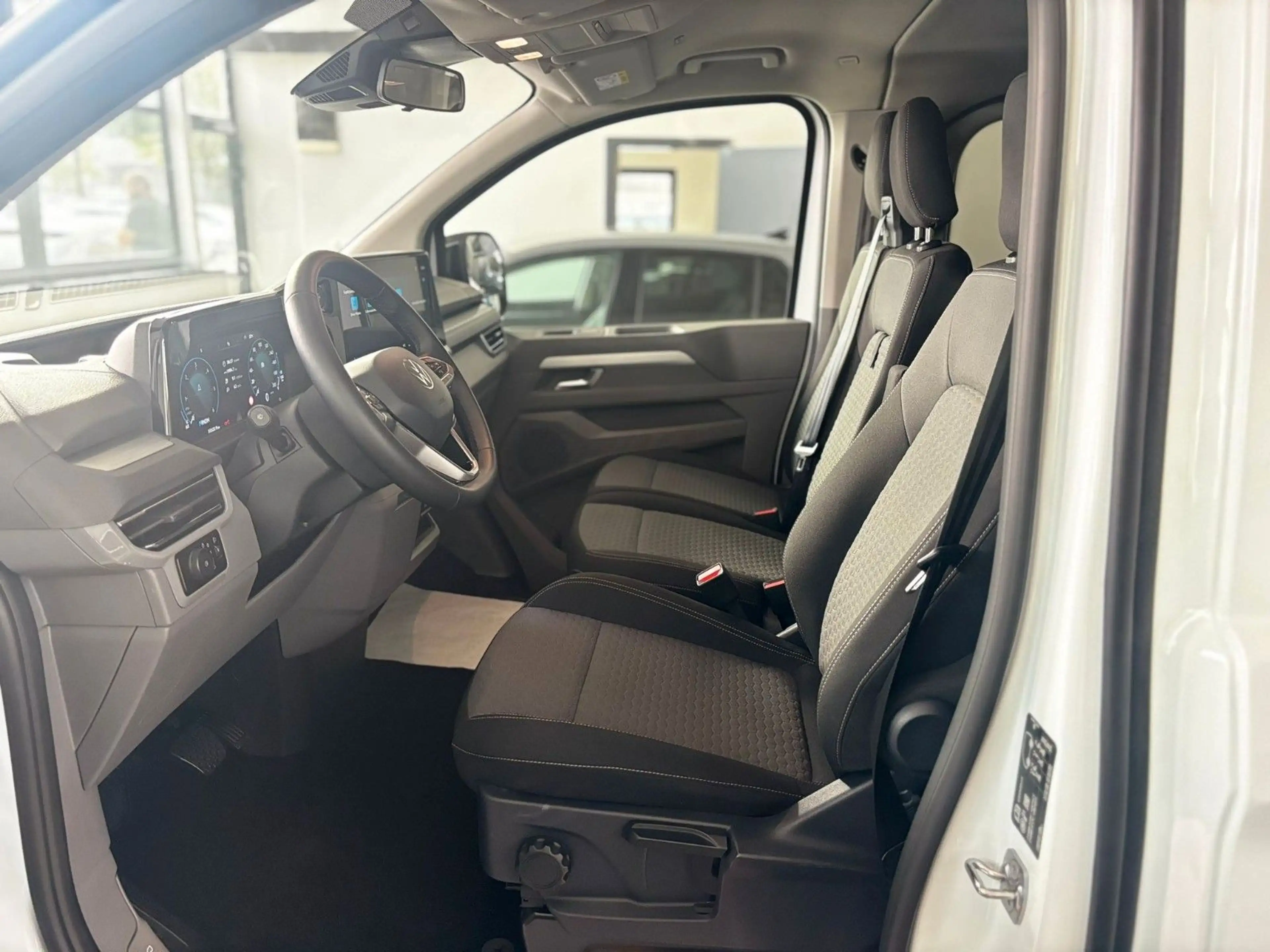 Volkswagen T7 Caravelle LED/KLIMA/9-Sitze/5J.GARANTIE — photo 12