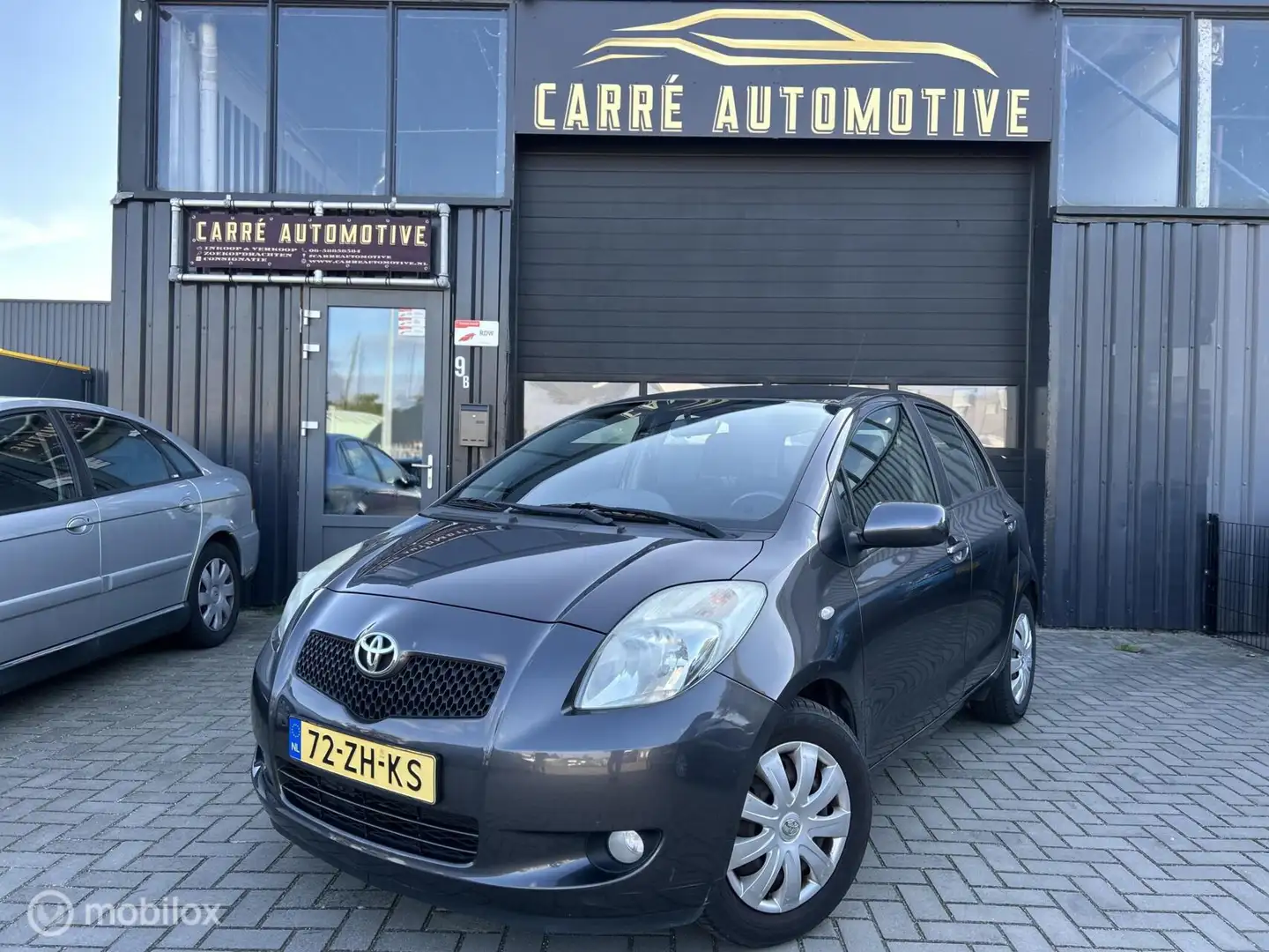 Toyota Yaris 1.3 VVTi Sol MMT | AUTOMAAT | NAP | AIRCO | Gris - 1