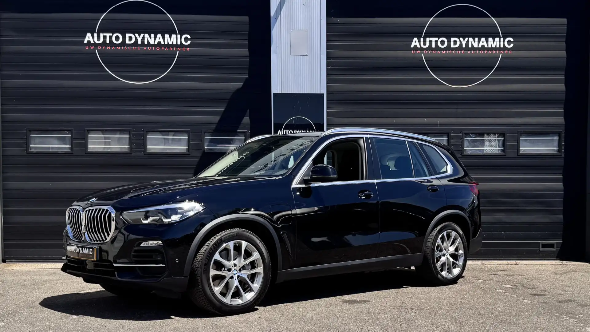 BMW X5 xDrive45e High Executive | Luchtvering | BTW Schwarz - 1