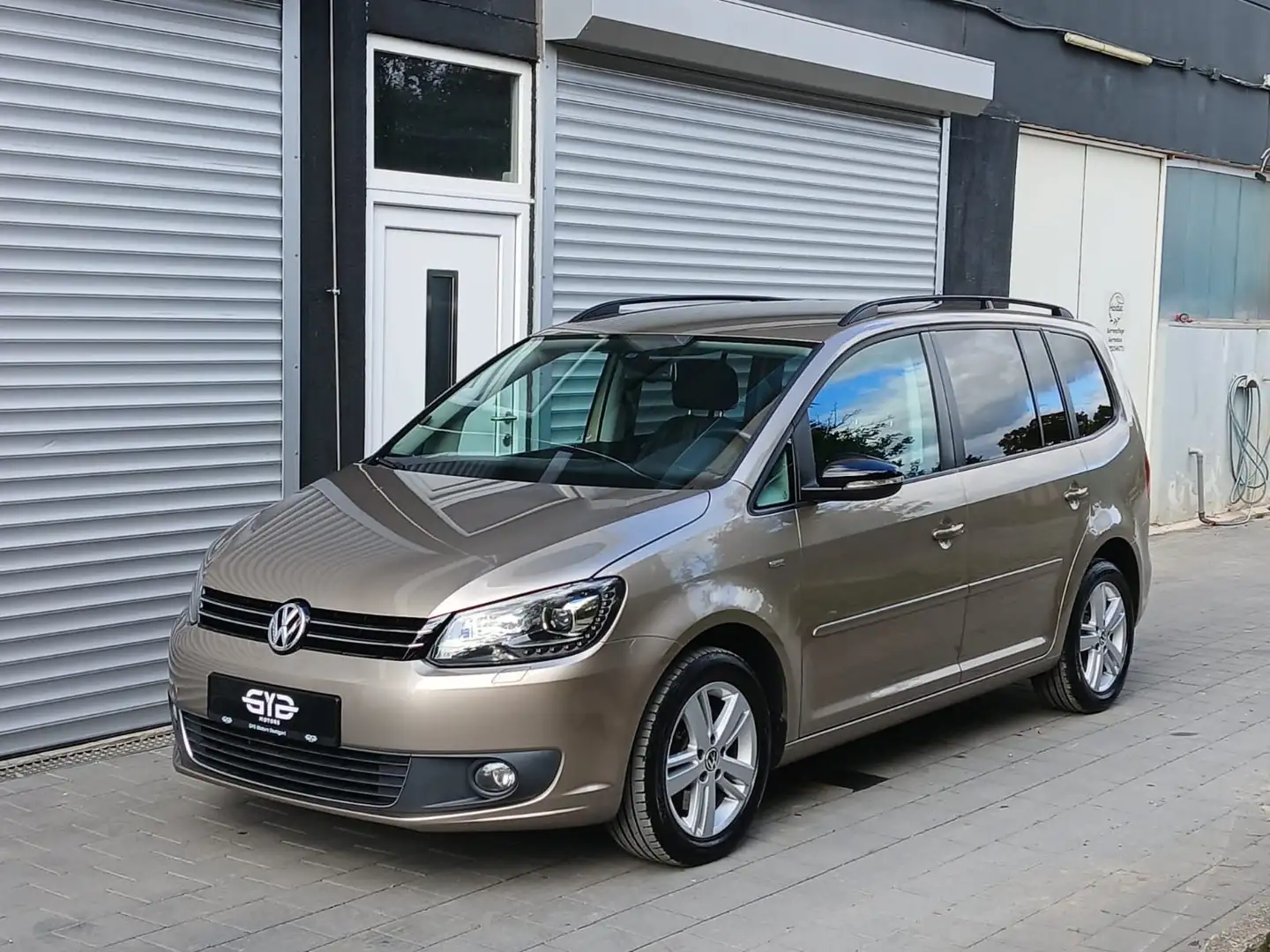 Volkswagen Touran *Garantie*Bi-Xenon*Navi*8-fach bereift* Beige - 1