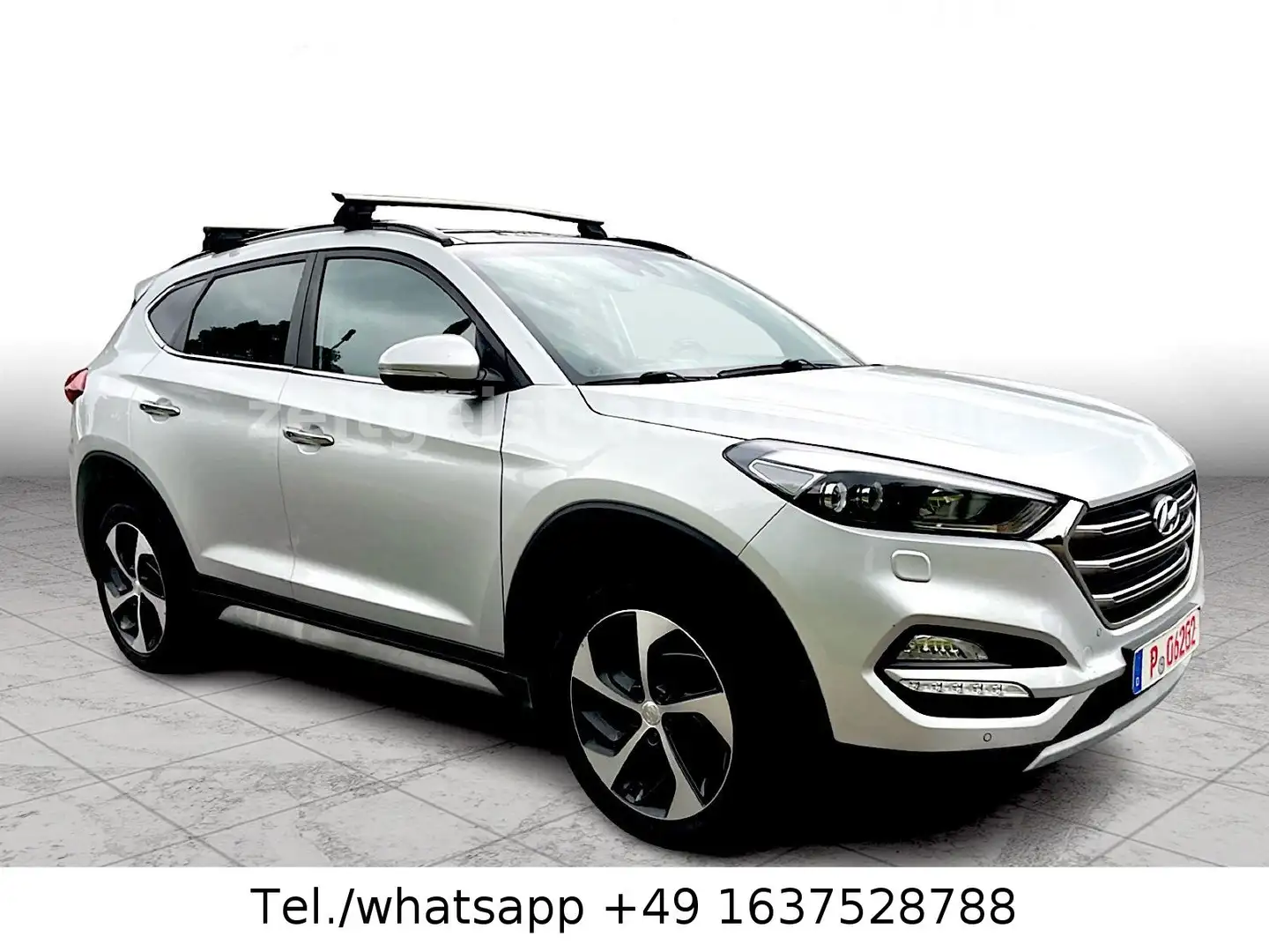 Hyundai TUCSON *VOLLAUSSTATTUNG*TÜV NEU & SERVICE NEU* Zilver - 1