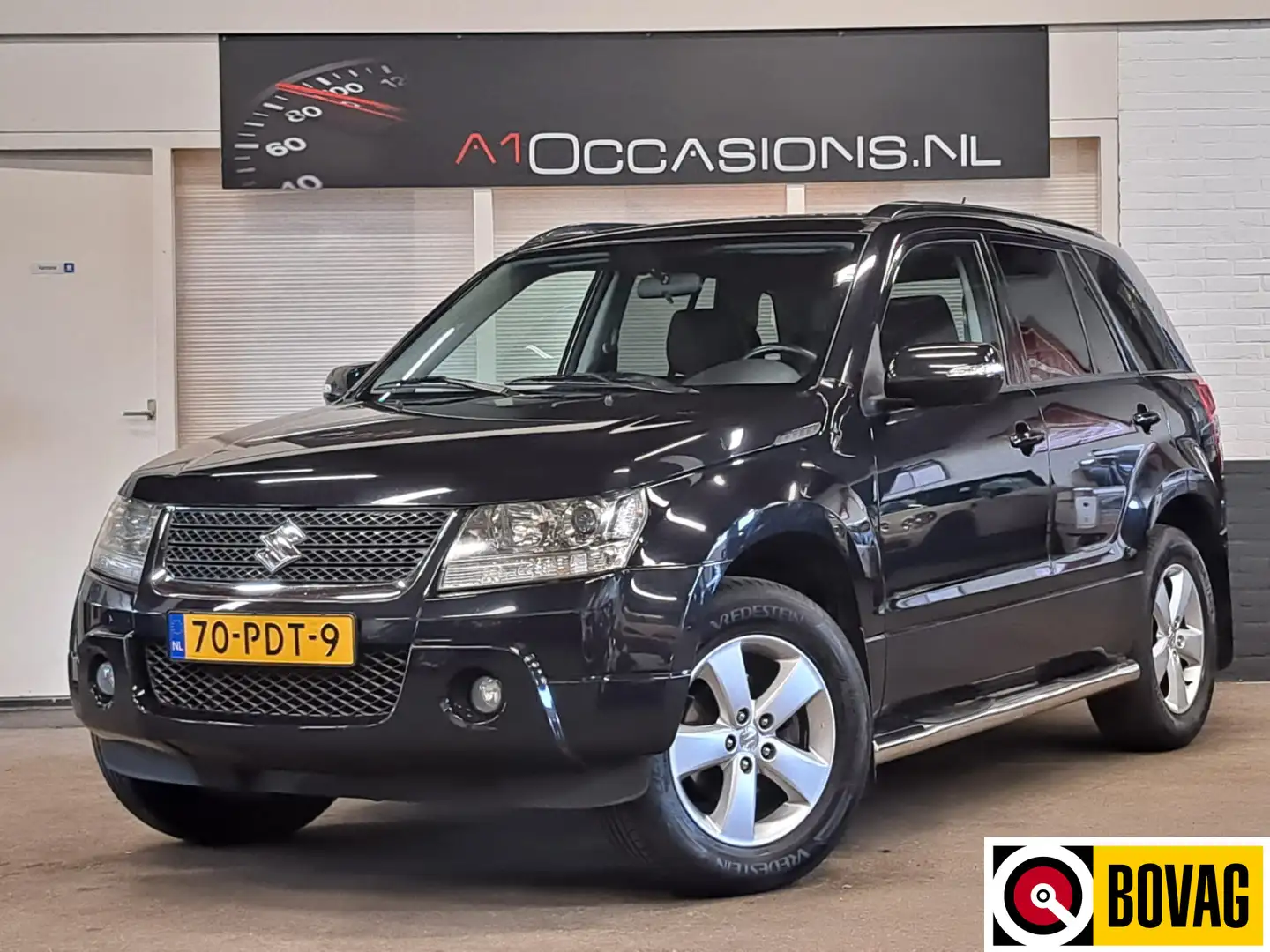 Suzuki Grand Vitara 2.4 Exclusive + STOELVERWARMING Zwart - 1