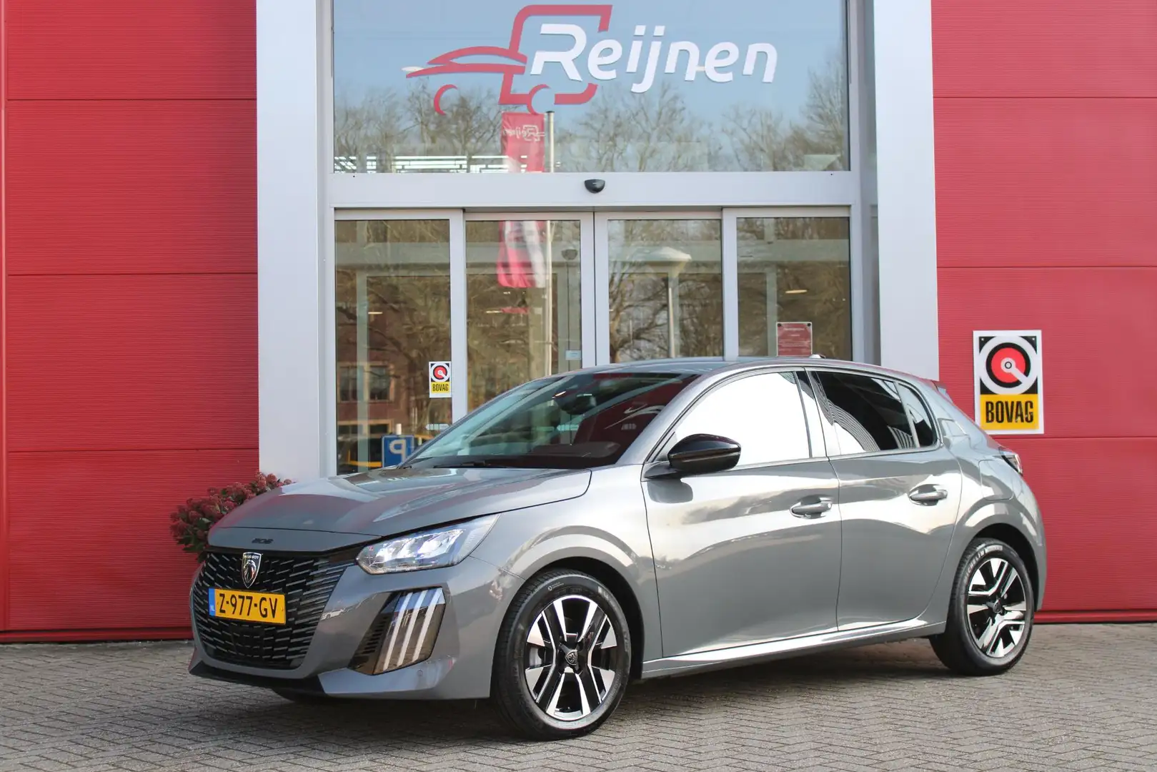 Peugeot 208 1.2 100PK ALLURE | ACHTERUITRIJ CAMERA | NAVIGATIE Grijs - 1