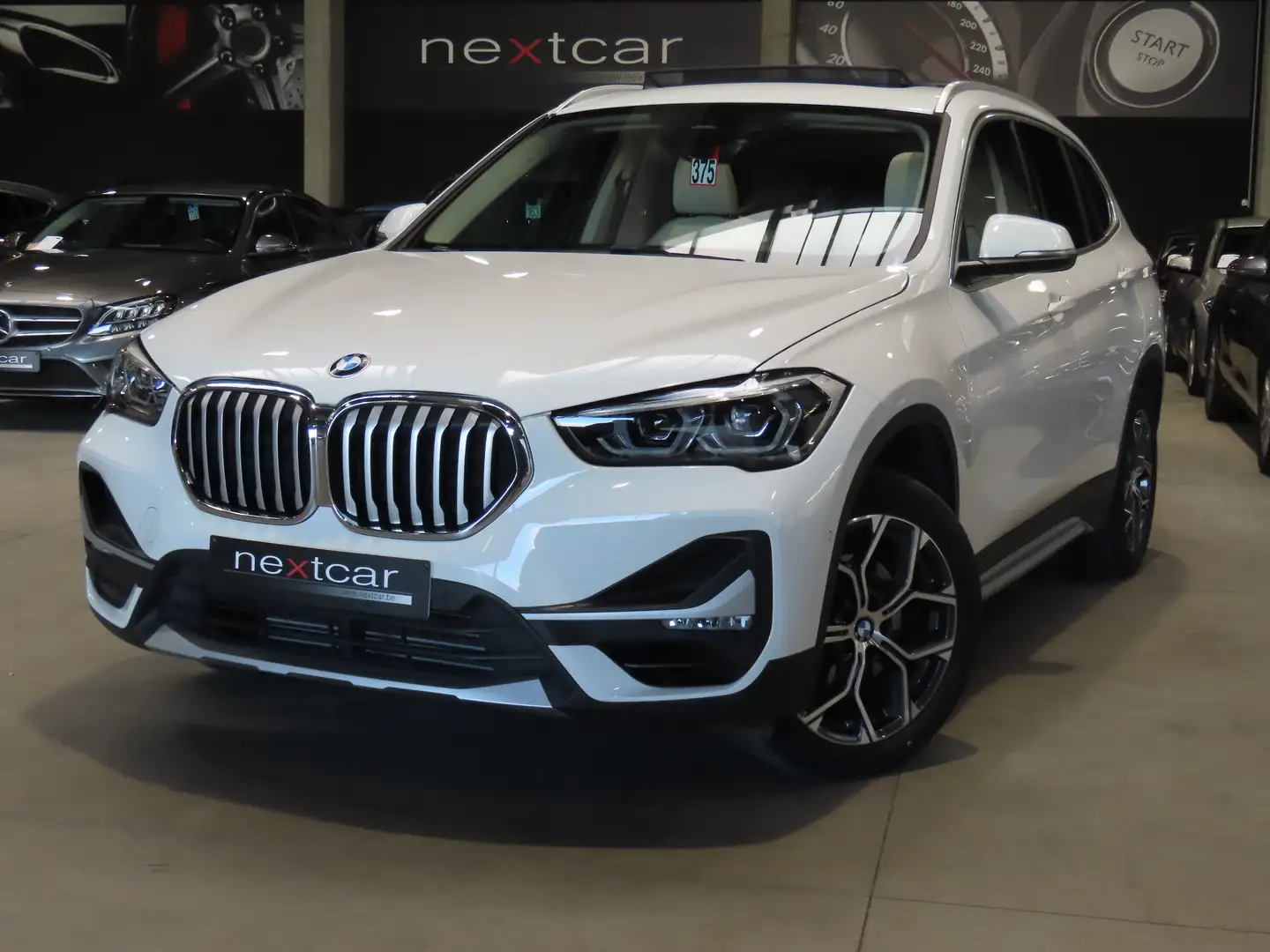 BMW X1 18iA sDrive XLINE PANO-CUIR-NAVIPRO-PARKING-CAMERA Blanc - 1