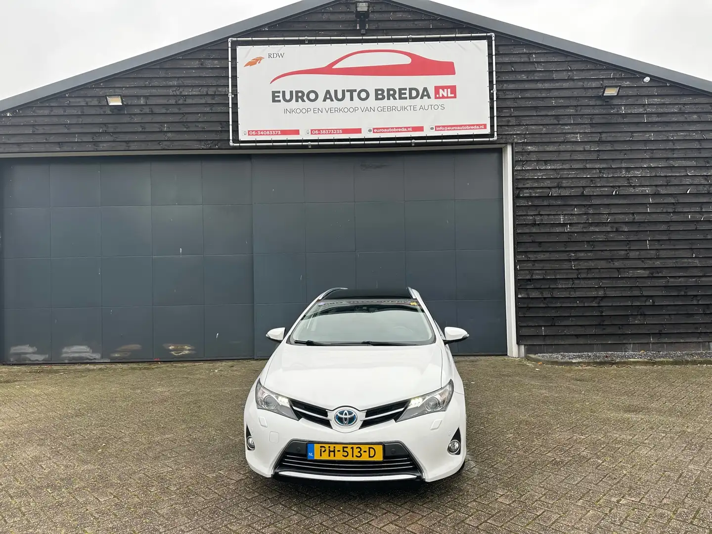 Toyota Auris Touring Sports 1.8 Hybrid Lease Exclusive Wit - 1