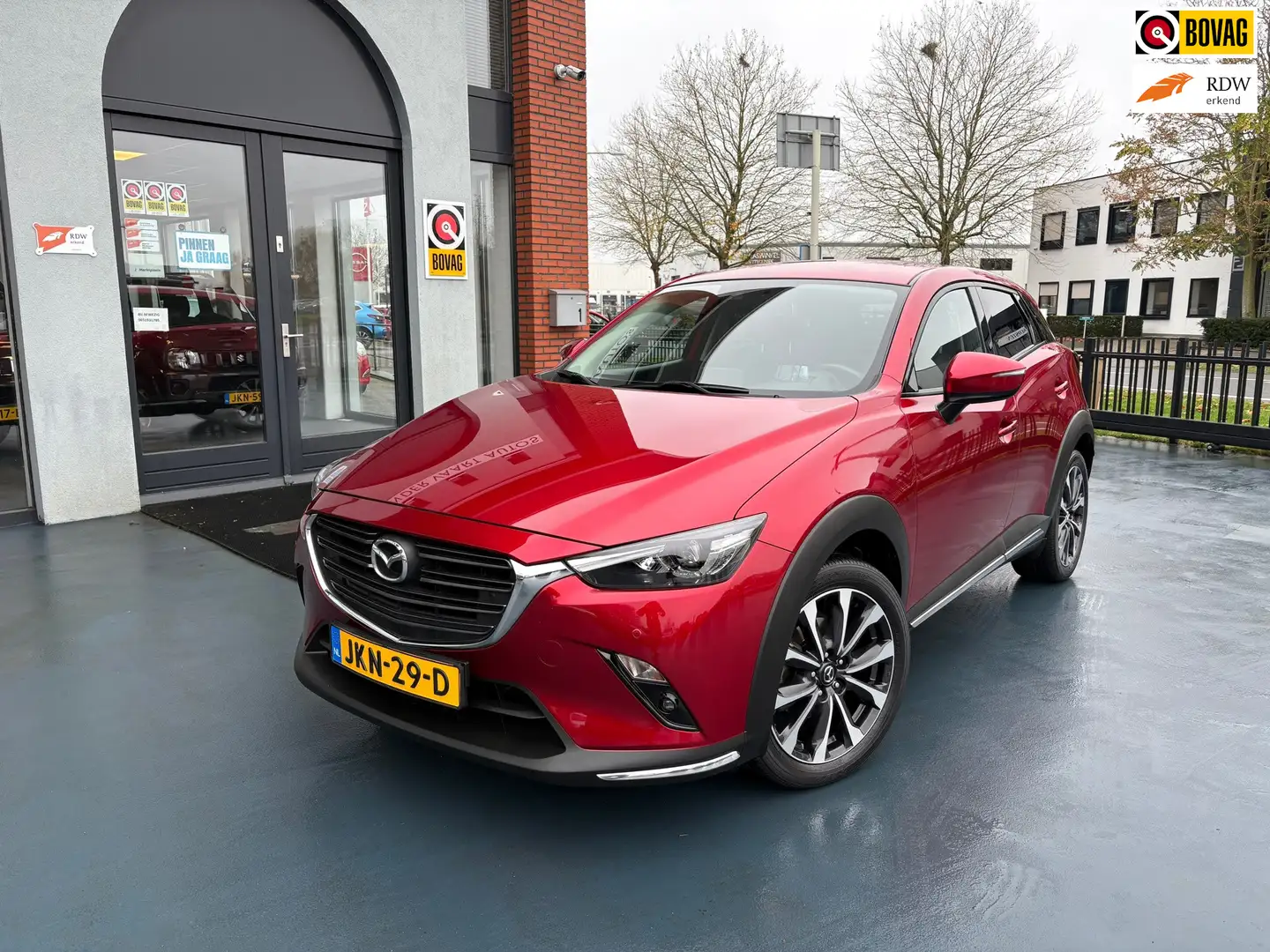Mazda CX-3 2.0 SkyActiv-G SPORTLINE 120 AUTOMAAT NAVI CLIMA Rojo - 1