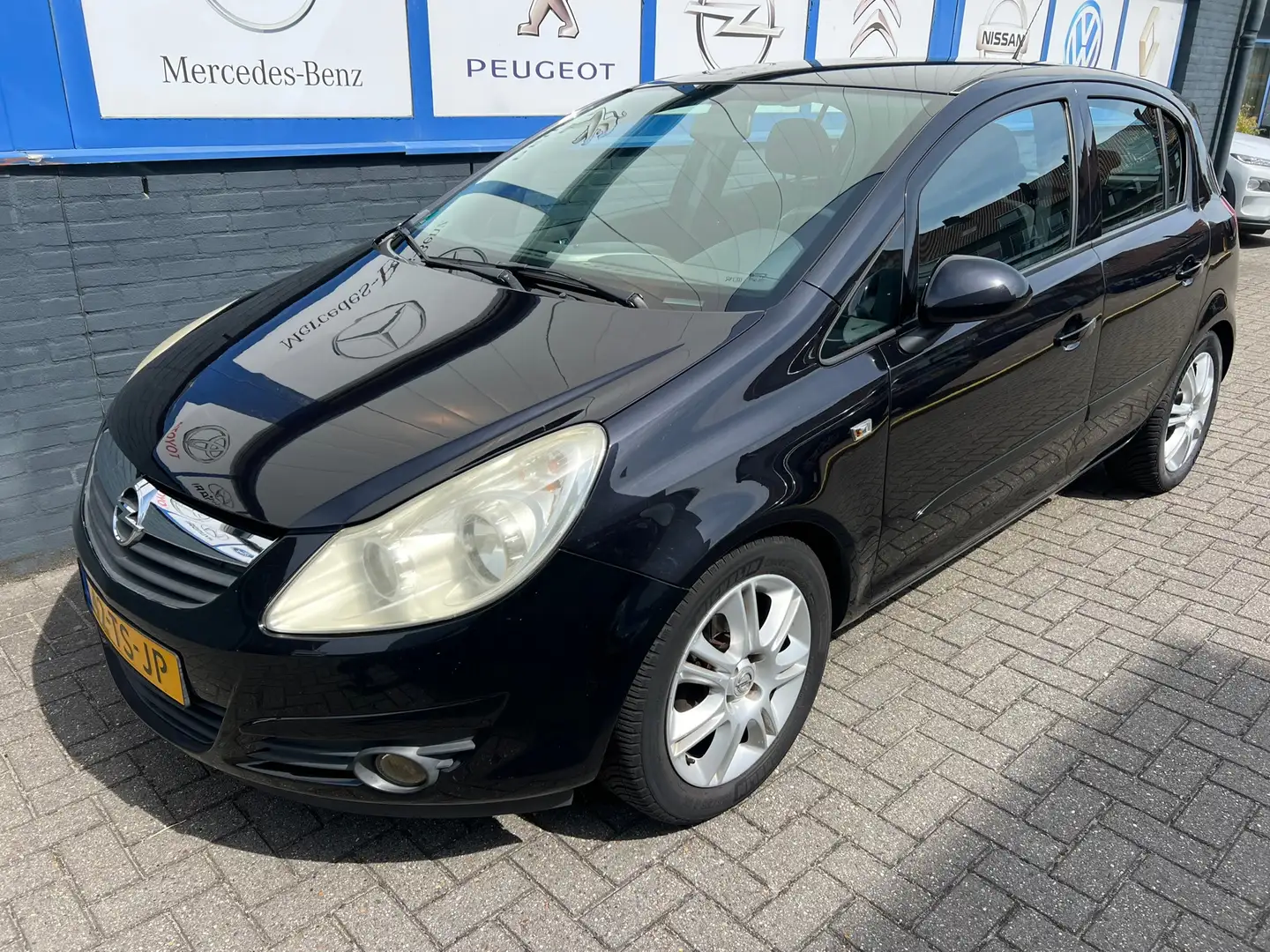 Opel Corsa 1.4-16V Enjoy 2007 NWE.APK 2995EU Negro - 2