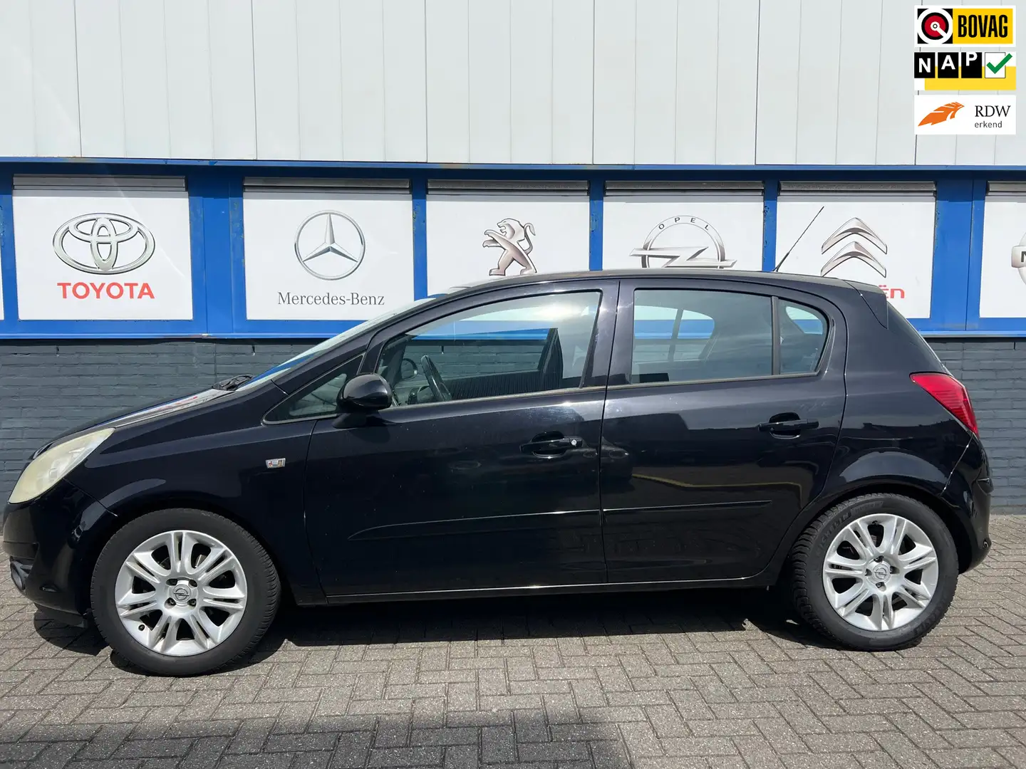 Opel Corsa 1.4-16V Enjoy 2007 NWE.APK 2995EU Negro - 1