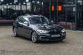 BMW 140 1-serie M140i Edition Shadow High Executive Zwart - thumbnail 1