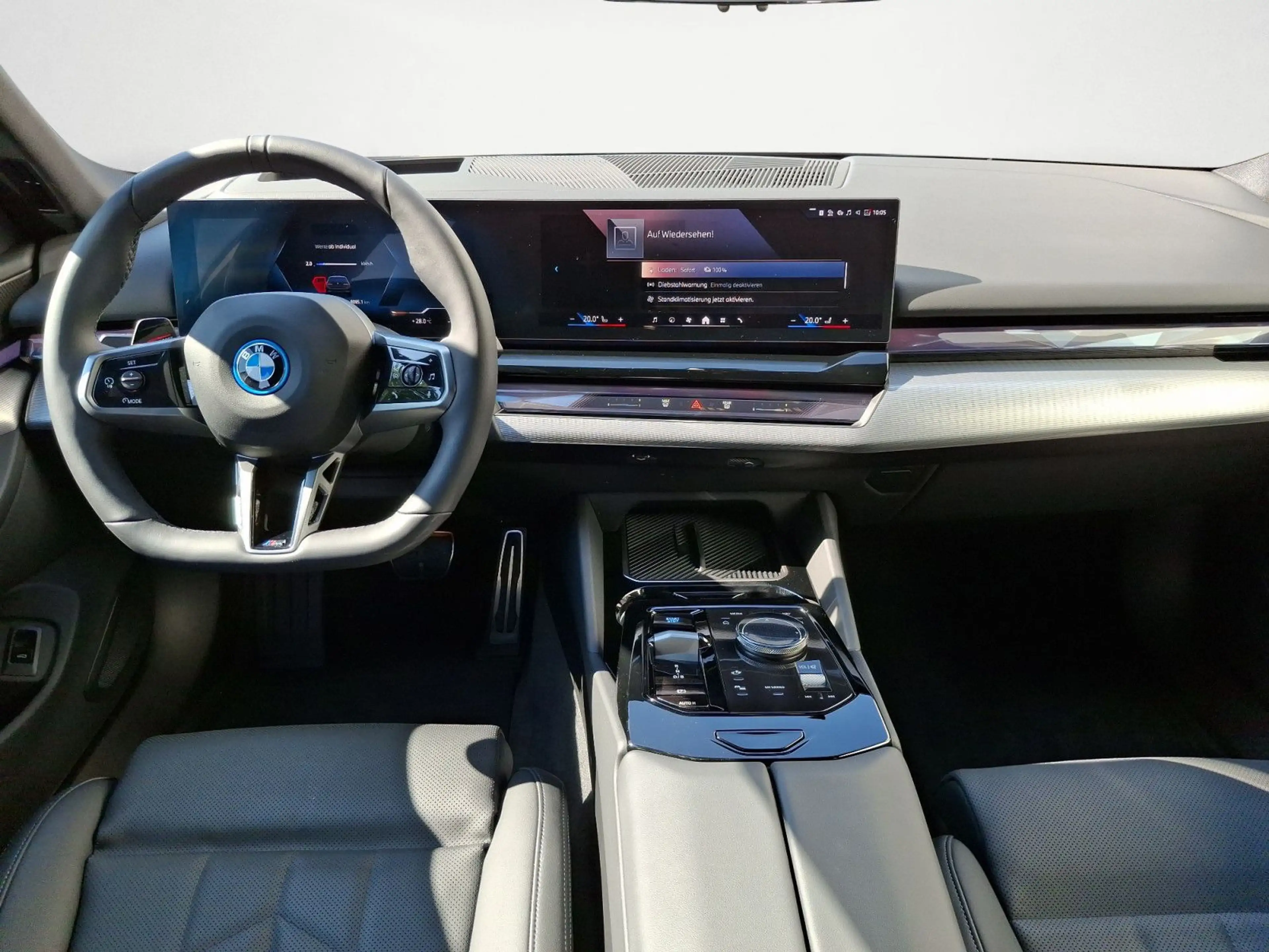 BMW i5 xDrive40 Touring M Sportpaket Pro AHK Driving — photo 13