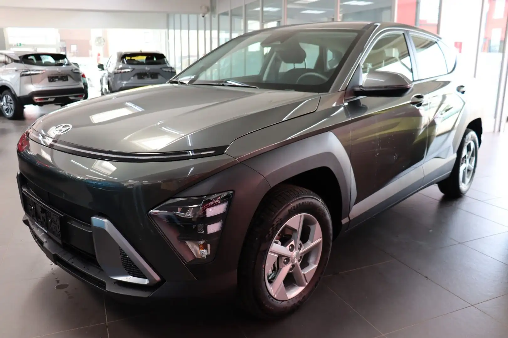 Hyundai KONA 1.0 T-Gdi LED,S.key,R.Cam,Navi,Tempo SOFORT Grau - 1