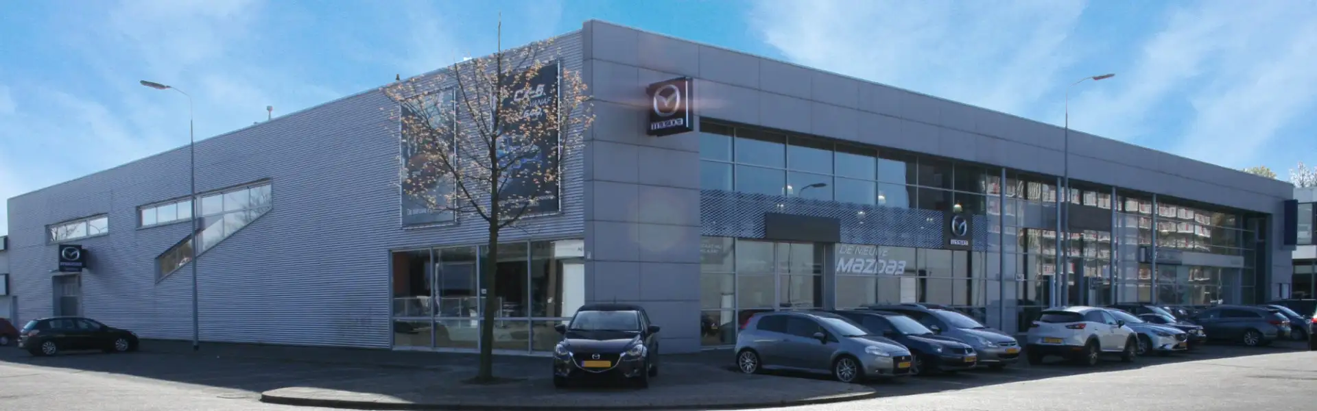 Mazda 3 1.6 Navigator / 58.000km!! Grijs - 1