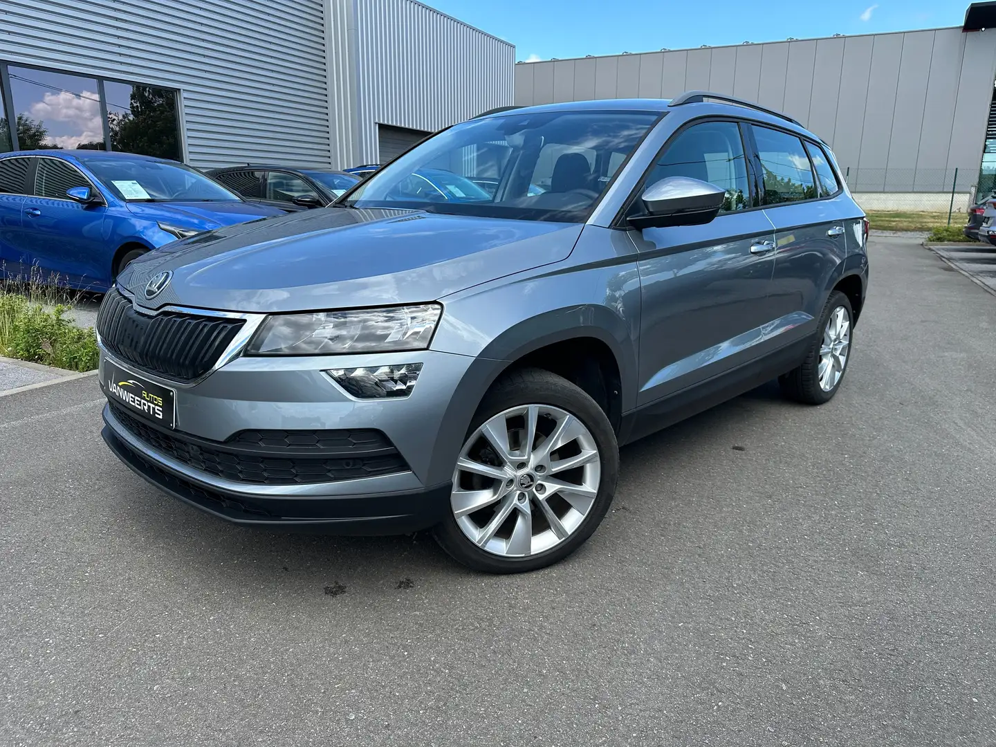 Skoda Karoq 1.0 TSI Ambition DSG AUTOM, CARPLAY/CAMERA/KEYLESS Grijs - 1