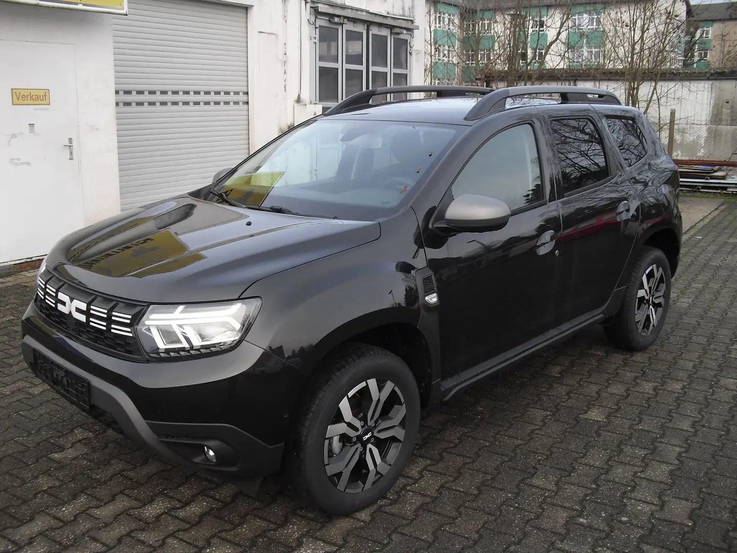Dacia Duster TCe 130 2WD Journey + Alu Klimaauto Navi Sitzheiz Noir - 1