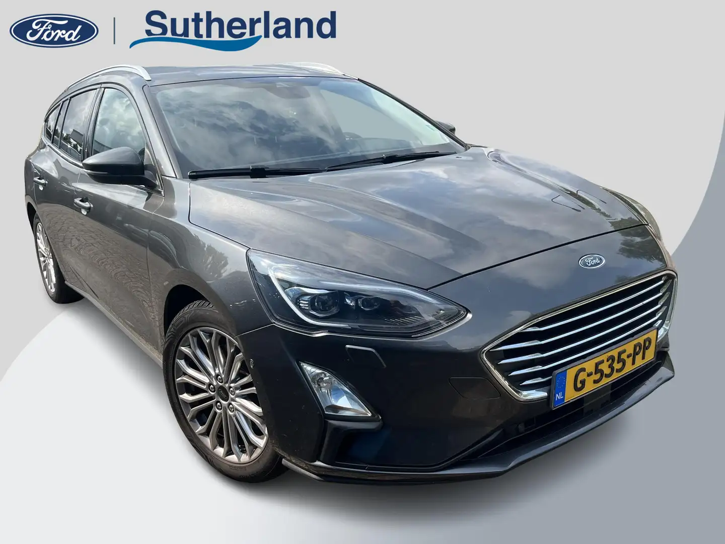 Ford Focus Wagon 1.0 EcoBoost Titanium Business 125pk Trekhaa Grijs - 1