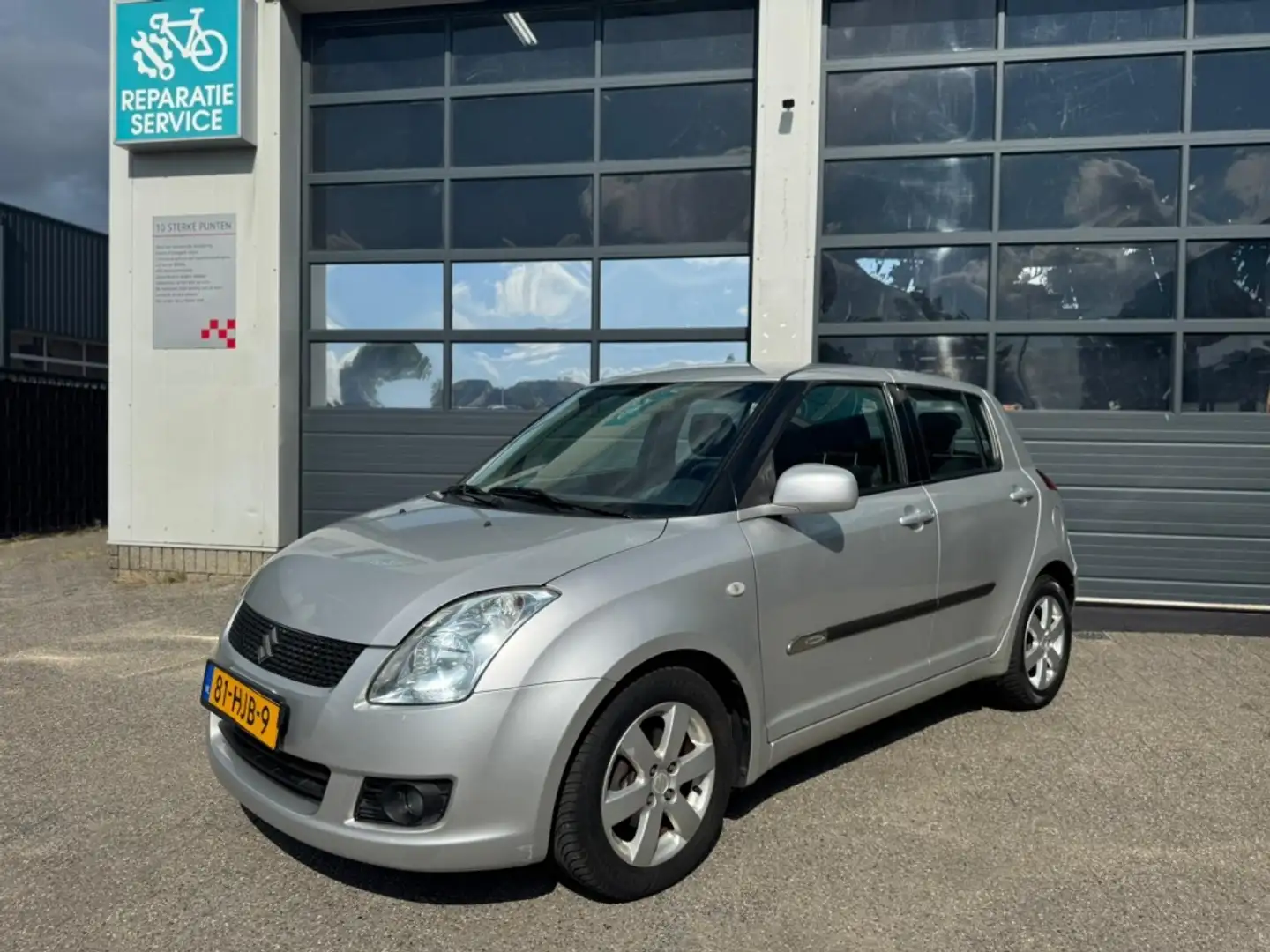 Suzuki Swift 1.3 Shogun Grijs - 2
