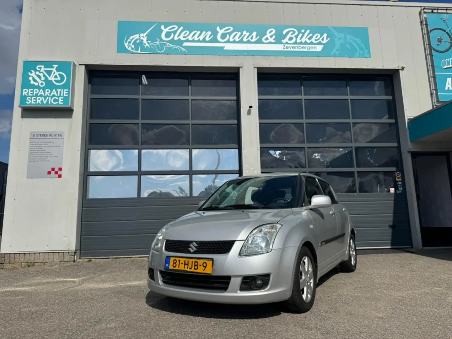 Suzuki Swift 1.3 Shogun Grijs - 1