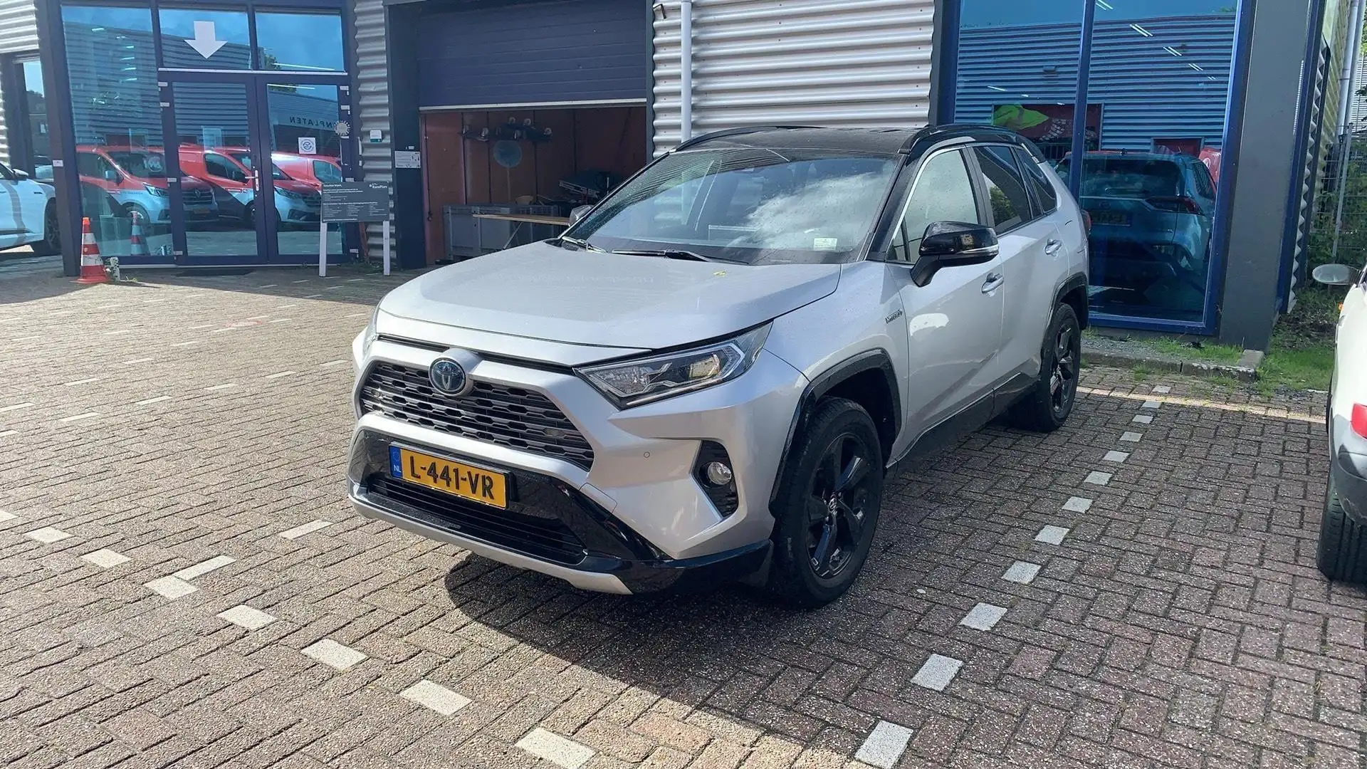 Toyota RAV 4 2.5 Hybrid Bi-Tone | Trekhaak | Adaptieve Cruise C Grijs - 1