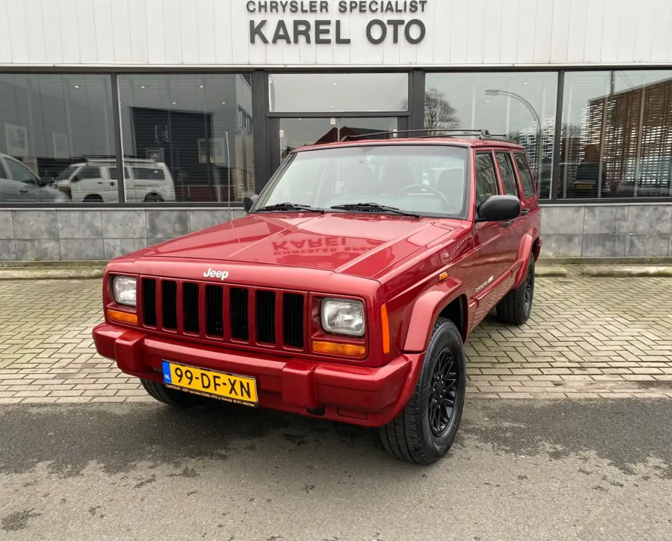 Jeep Cherokee 4.0i sport Red - 1