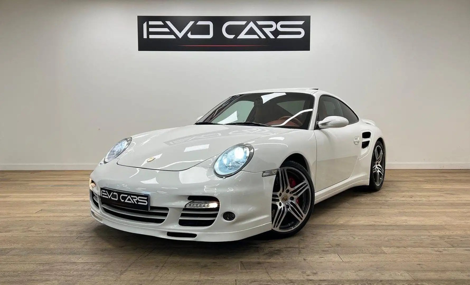 Porsche 911 997 Turbo 480 ch TipTronic / BOSE / Chrono / PASM  Белый - 1