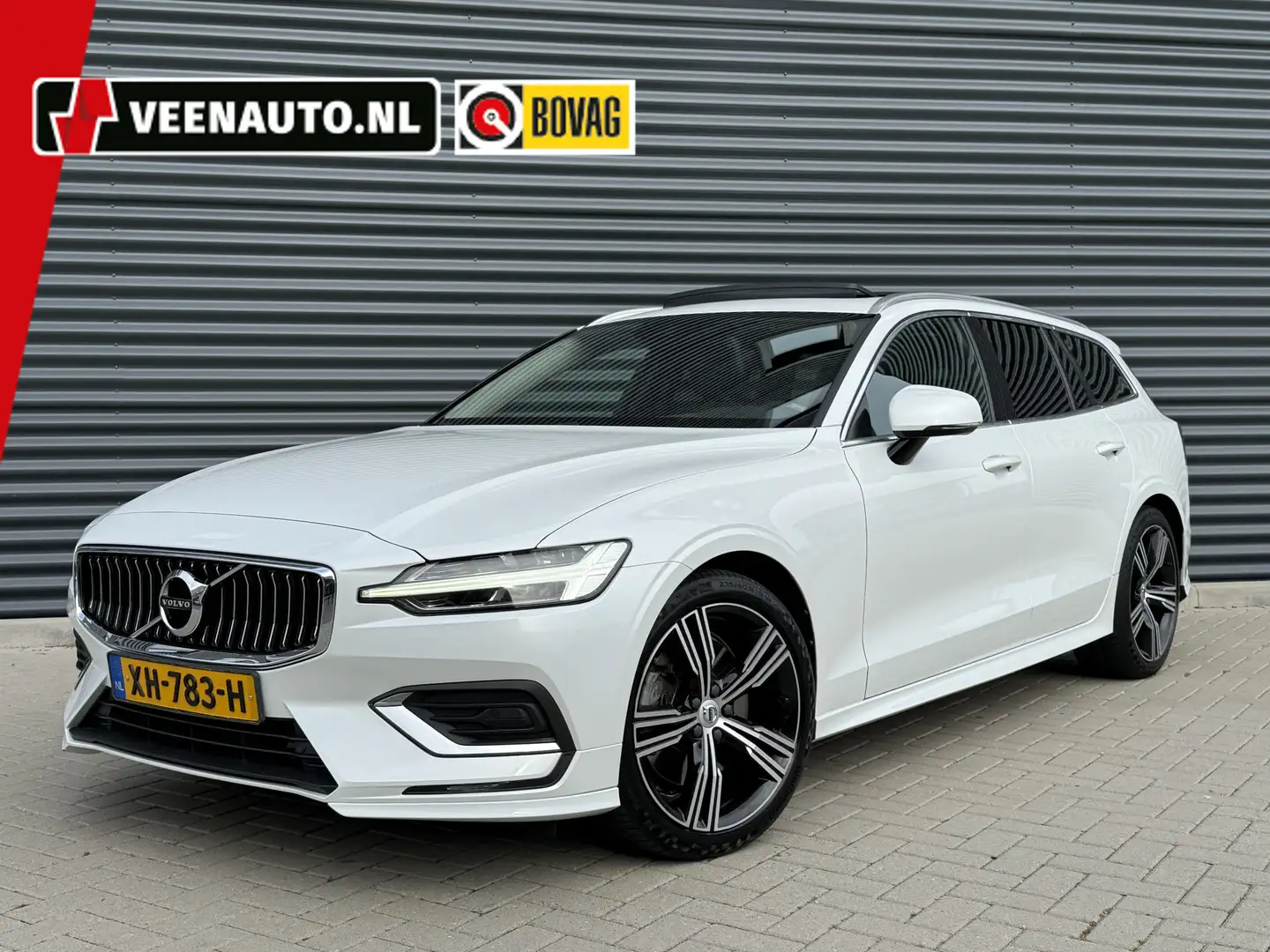 Volvo V60 2.0 T5 R-Line Pano/Trekhaak/Harman Kardon Weiß - 1