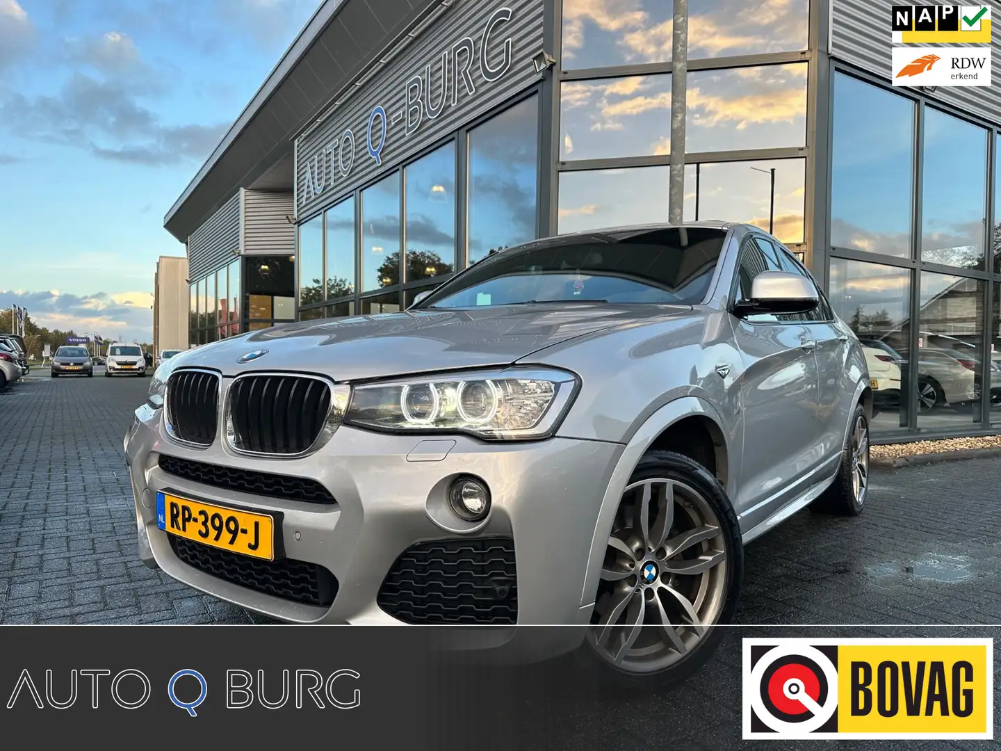 BMW X4 XDrive20d High Executive M Sport Edition | Leder | Grijs - 1