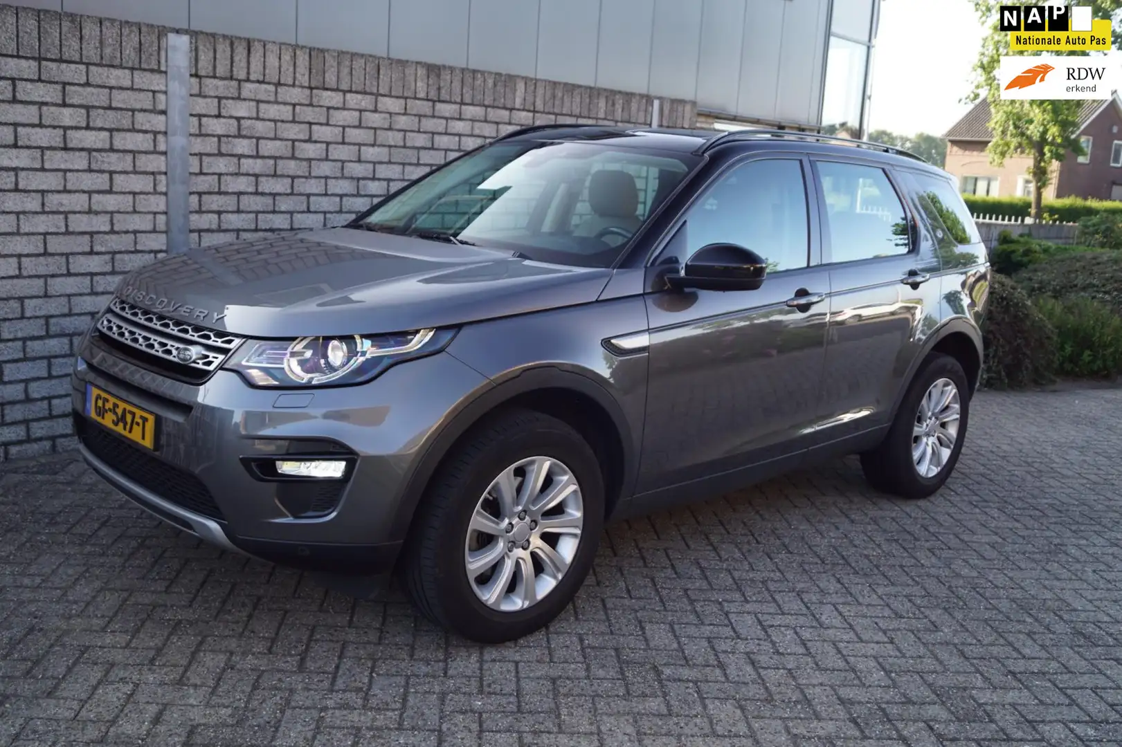 Land Rover Discovery Sport 2.0 Si4 4WD HSE Autom 241PK Xeno Leder Stoelverw N Grijs - 1