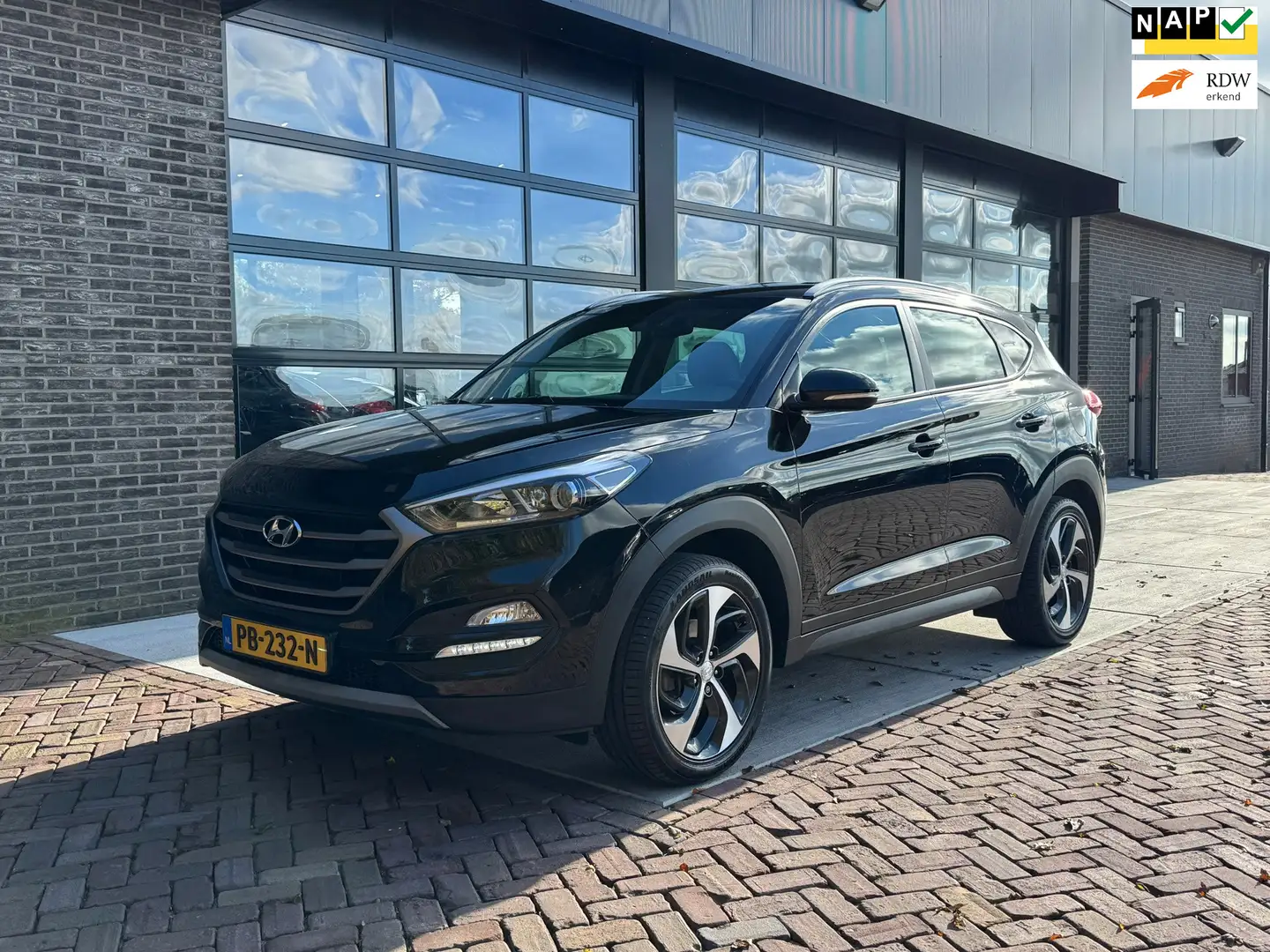 Hyundai TUCSON 1.6 GDi Anniversary Edition | Camera | Trekhaak | Noir - 1