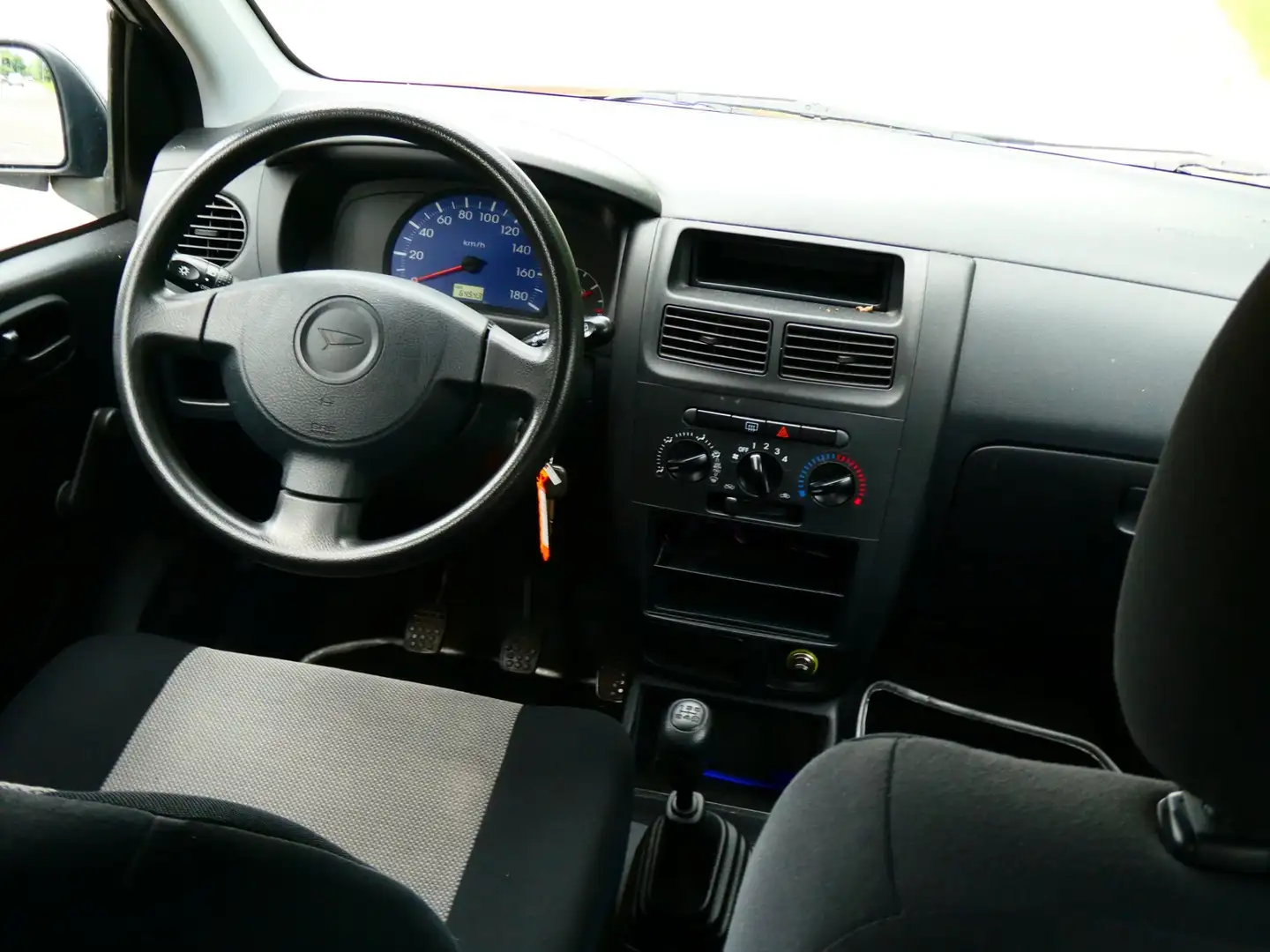 Daihatsu Cuore 1.0-12V 2e eig. 64.000km. Stuurbekr. Zuinig Nette Grau - 2
